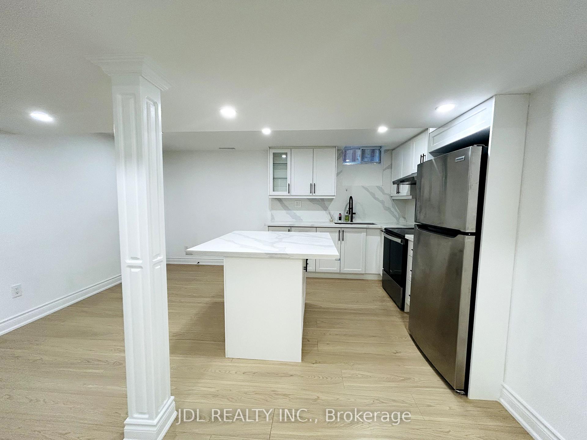 Photo 7 of Unit Bsmt, 22 Lionheart Lane, Markham, Berczy — HOMEH