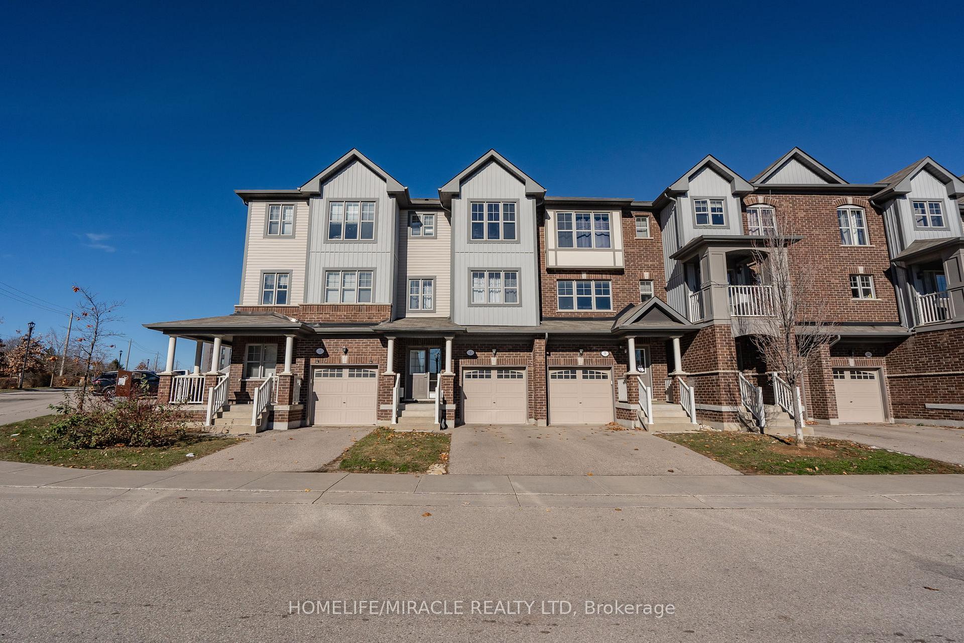 Front of Unit 8, 701 Homer Watson Boulevard