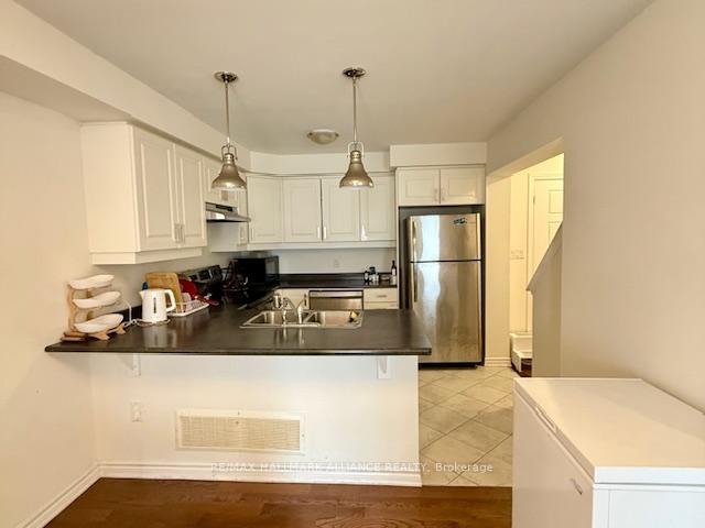 Photo 16 of Unit 65, 1000 Asleton Boulevard, Milton, Willmott — HOMEH