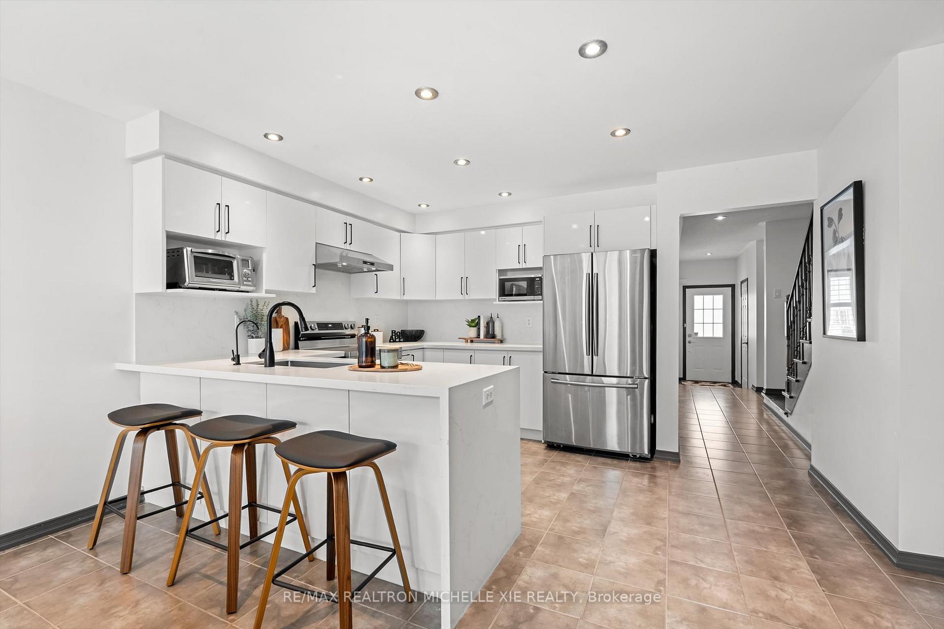 Photo 10 of 1049 Bur Oak Avenue, Markham, Wismer — HOMEH
