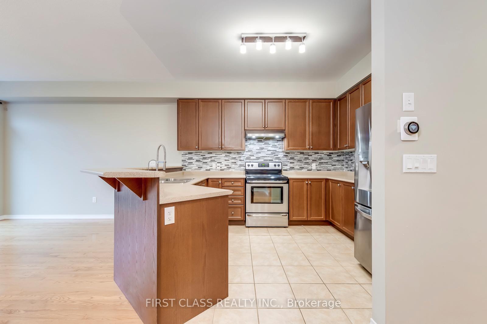 Photo 5 of Unit 39, 651 Farmstead Drive, Milton, Willmott — HOMEH
