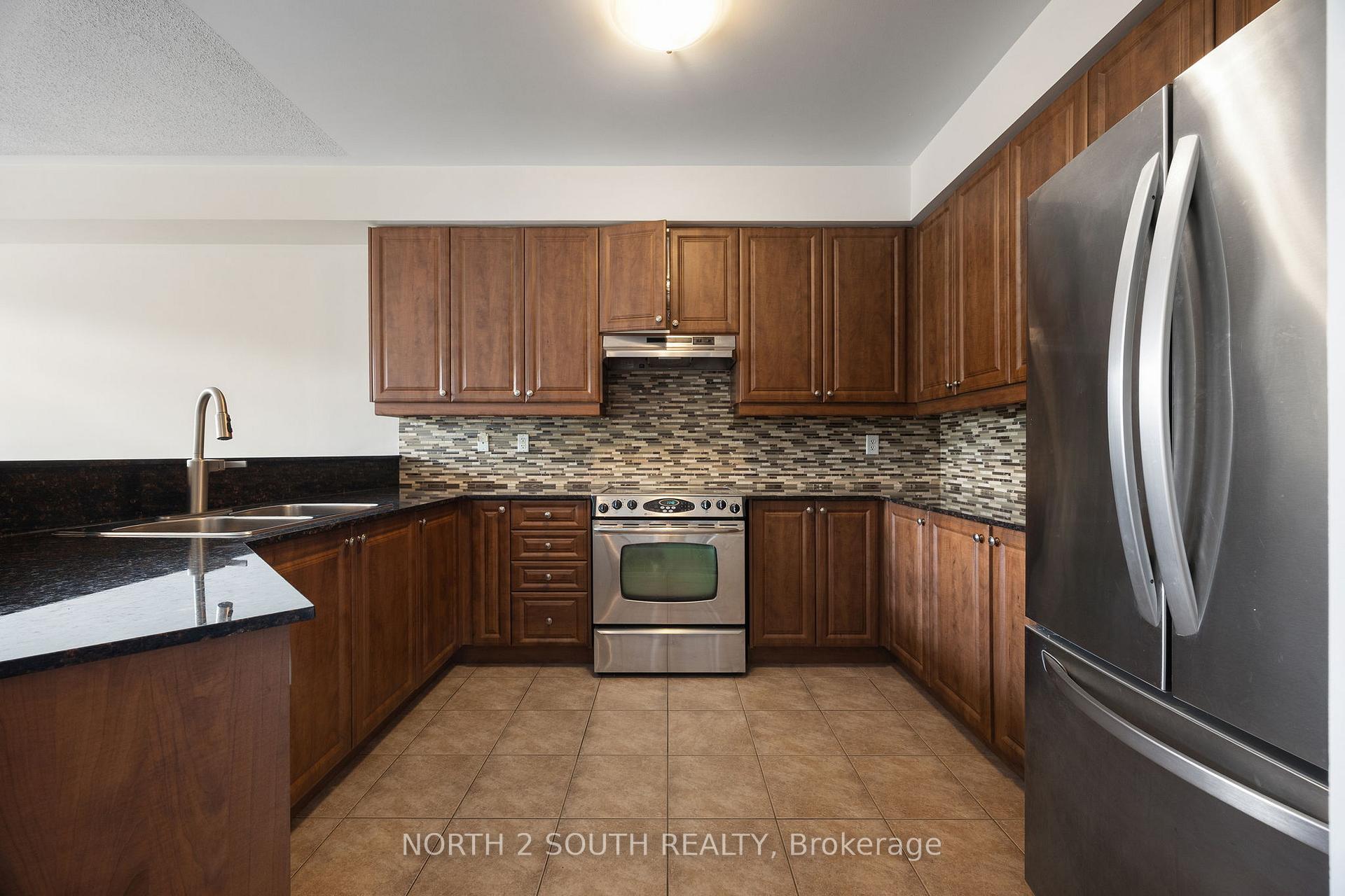 Photo 9 of Unit 39, 745 Farmstead Drive, Milton, Willmott — HOMEH