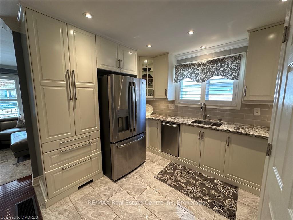 Photo 3 of Unit 1, 223 Picton Street E, Hamilton, North End — HOMEH