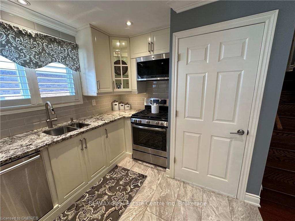 Photo 4 of Unit 1, 223 Picton Street E, Hamilton, North End — HOMEH
