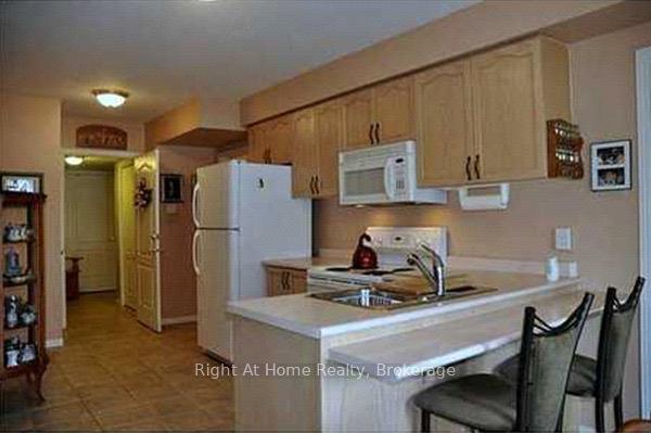 Photo 5 of Unit LOWER, 127 Bridgeport Crescent, Hamilton, Meadowlands — HOMEH