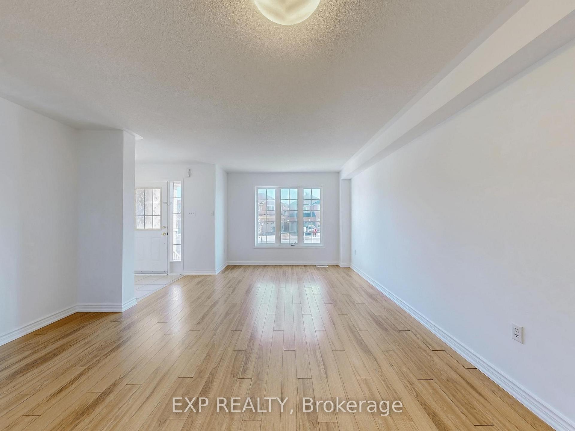 Photo 3 of 702 Castlemore Avenue, Markham, Wismer — HOMEH