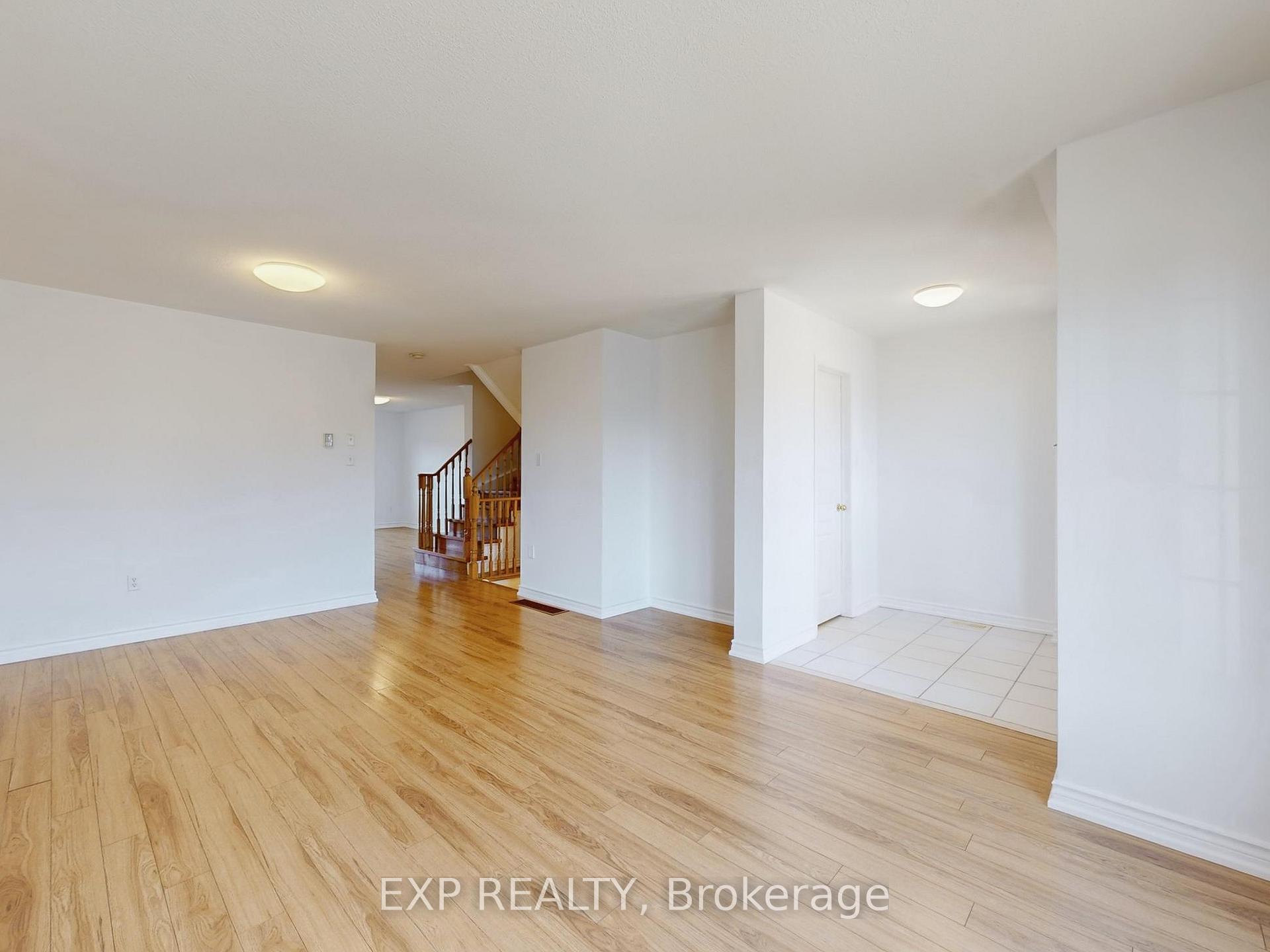 Photo 4 of 702 Castlemore Avenue, Markham, Wismer — HOMEH