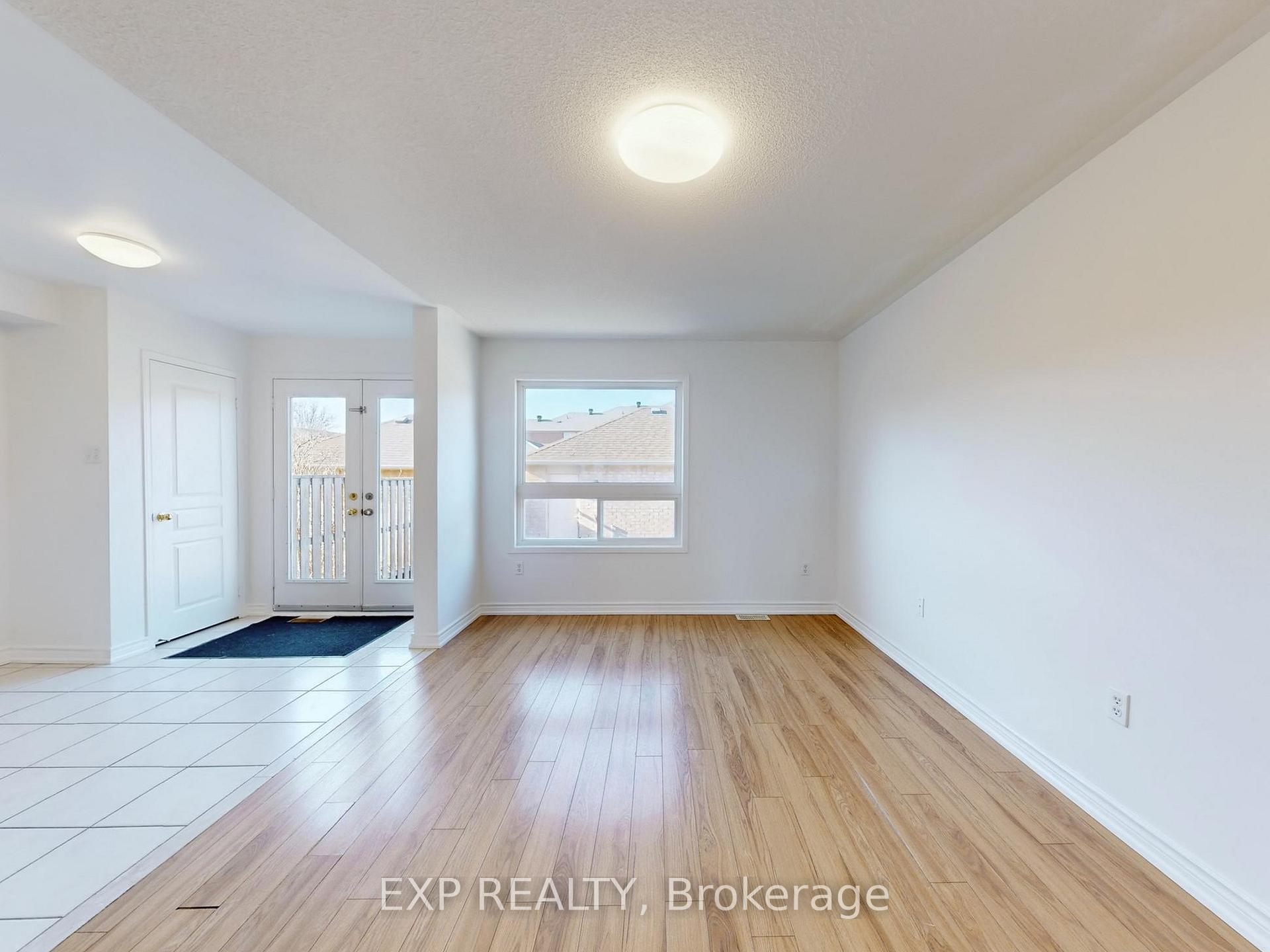 Photo 5 of 702 Castlemore Avenue, Markham, Wismer — HOMEH