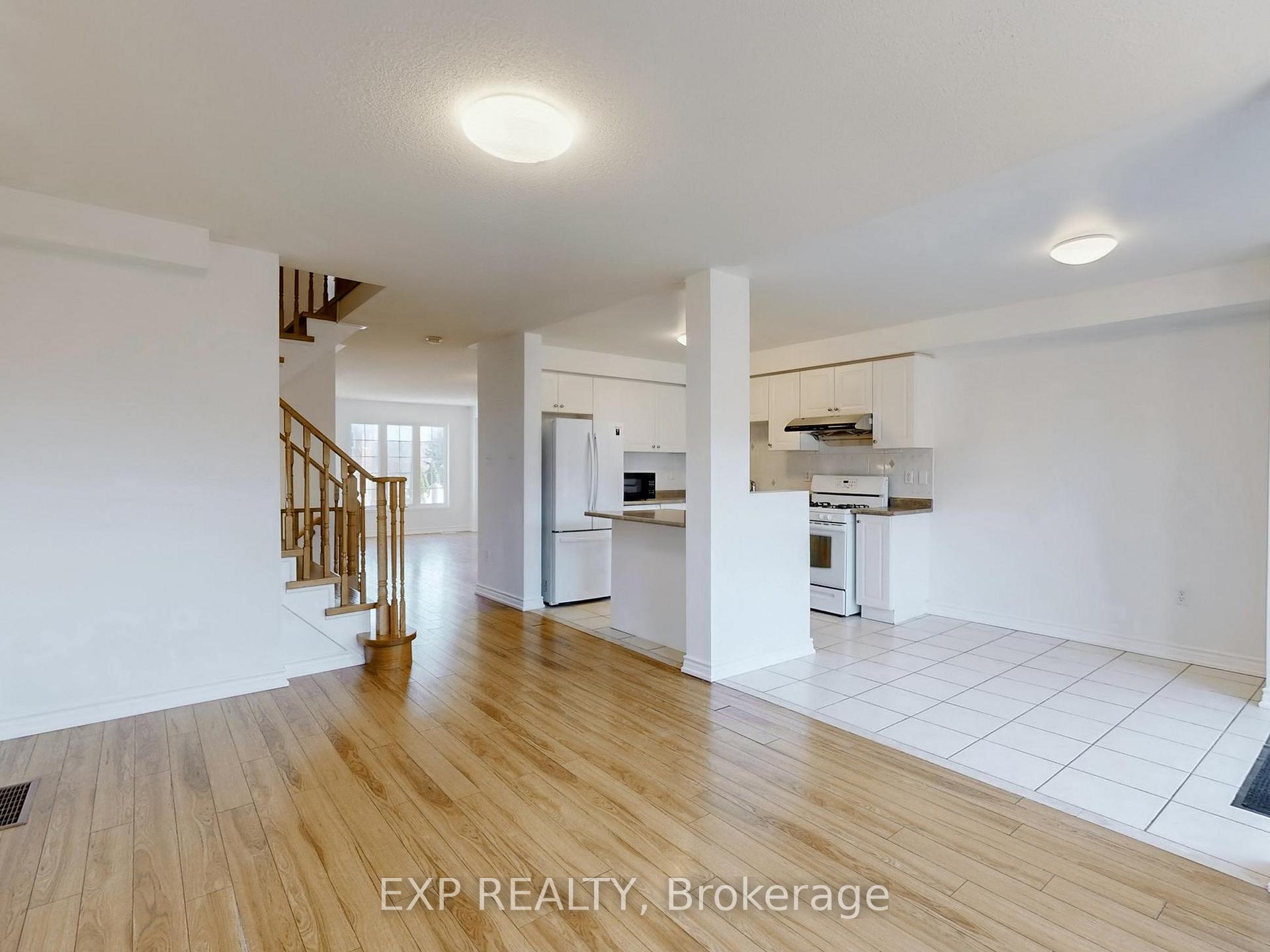 Photo 7 of 702 Castlemore Avenue, Markham, Wismer — HOMEH