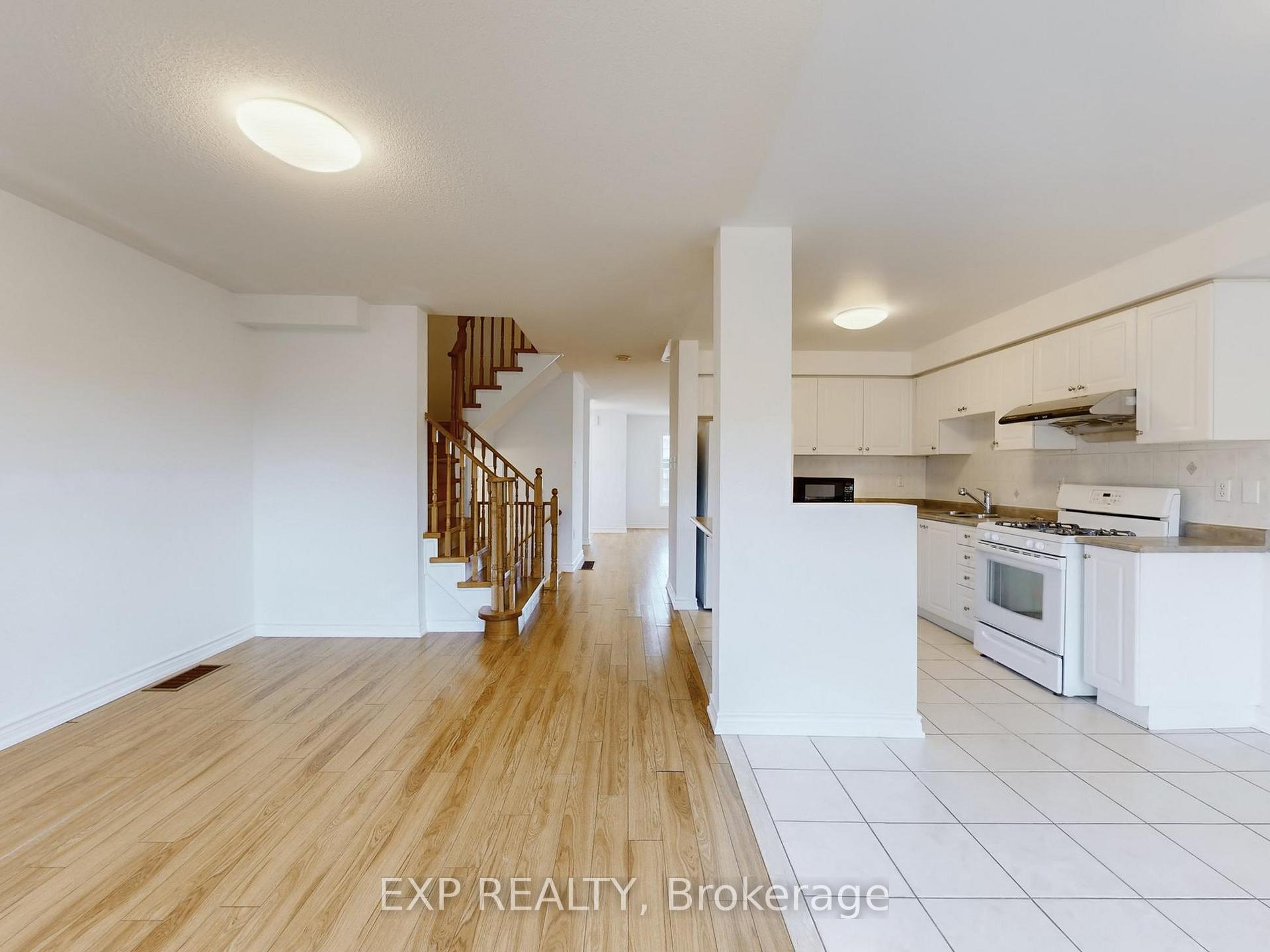 Photo 8 of 702 Castlemore Avenue, Markham, Wismer — HOMEH