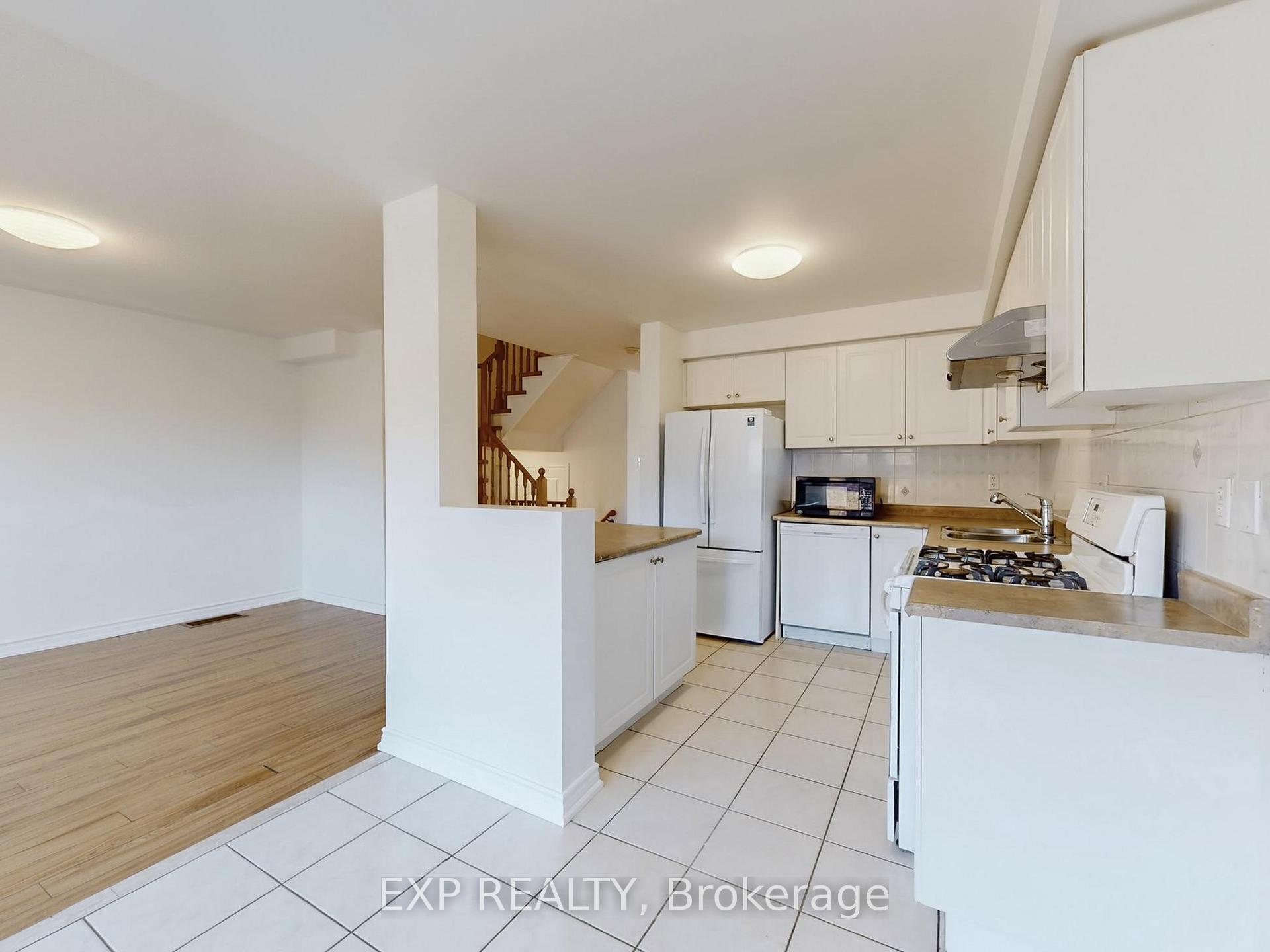 Photo 9 of 702 Castlemore Avenue, Markham, Wismer — HOMEH