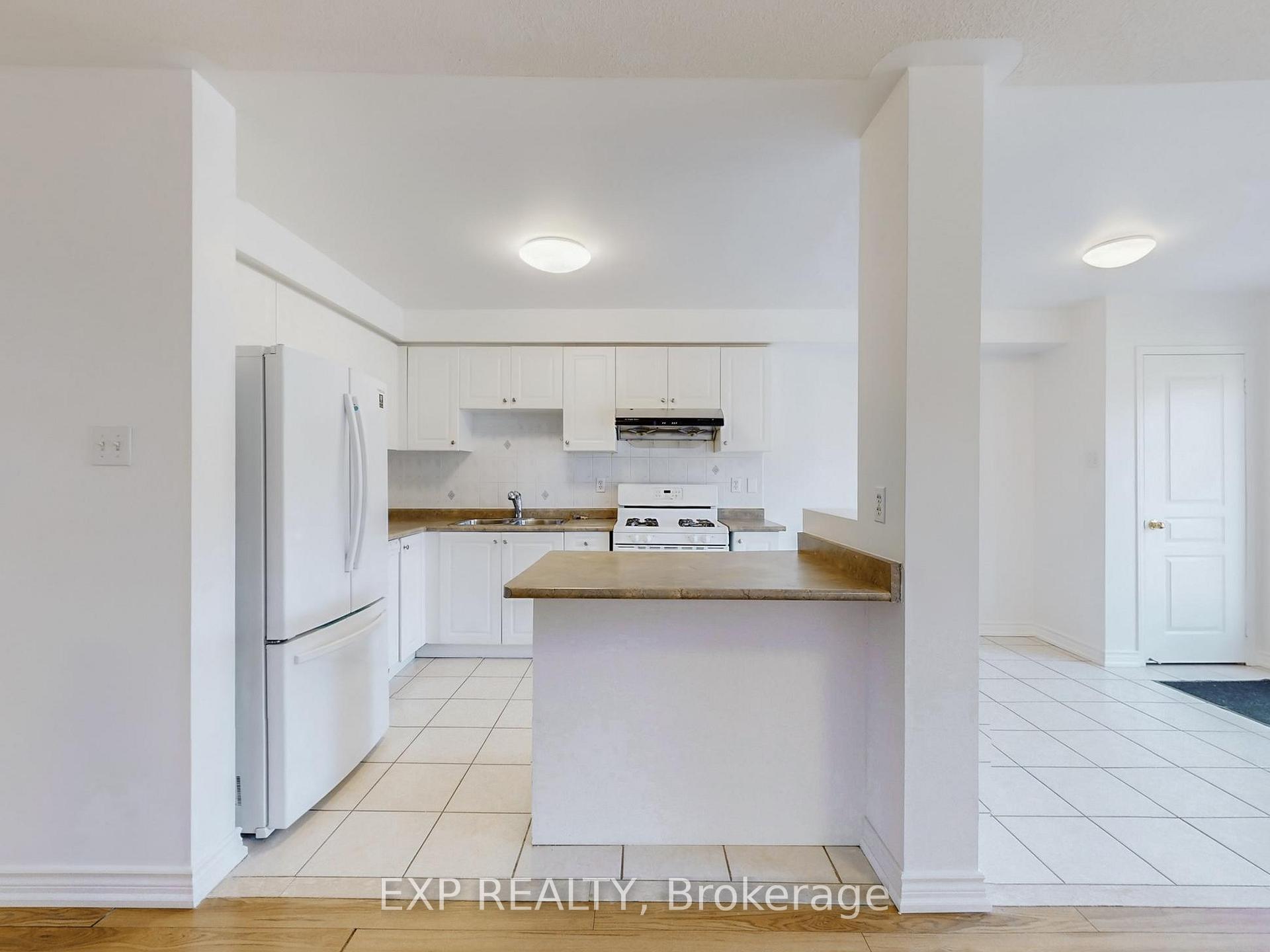 Photo 10 of 702 Castlemore Avenue, Markham, Wismer — HOMEH