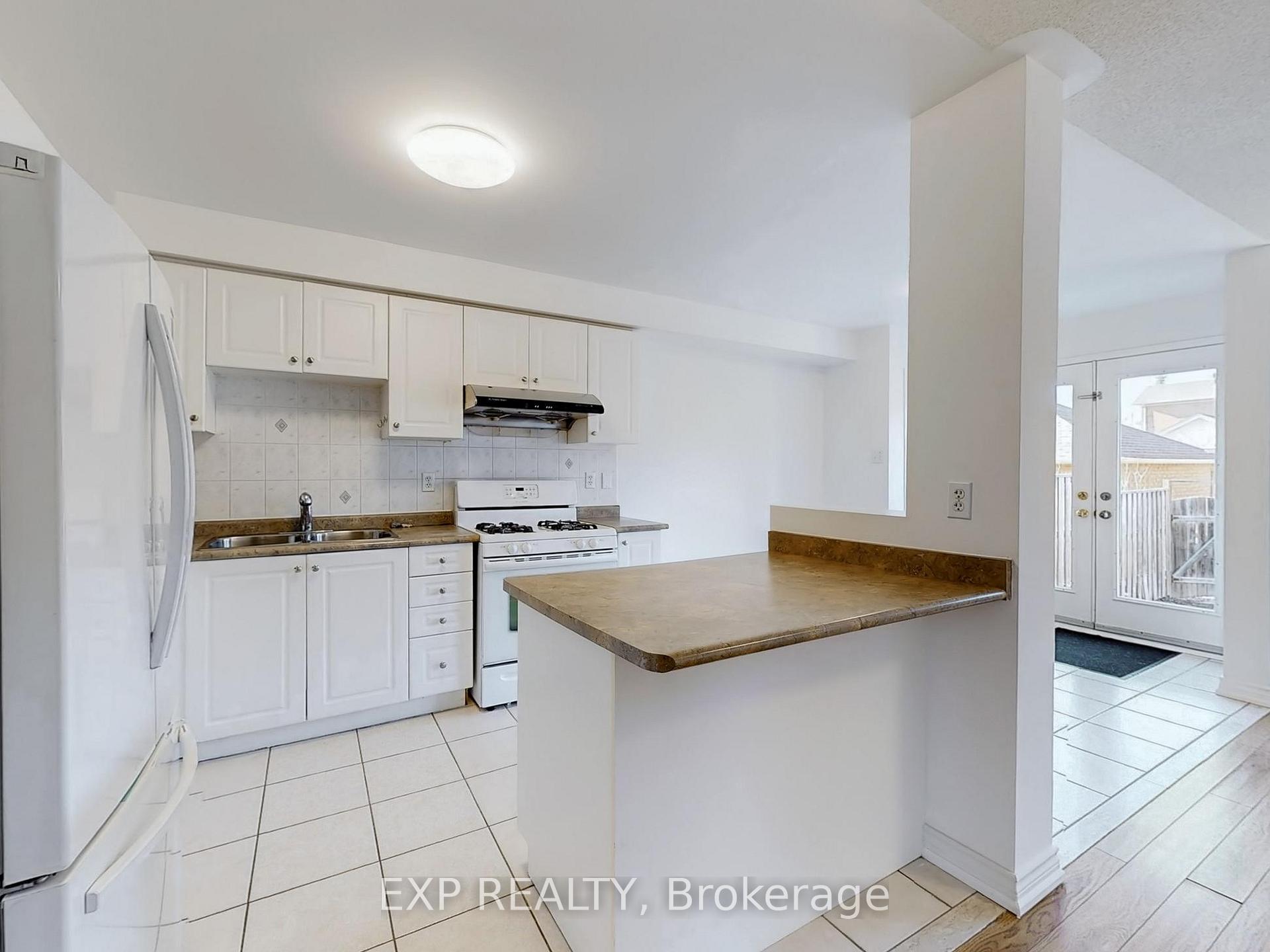 Photo 11 of 702 Castlemore Avenue, Markham, Wismer — HOMEH