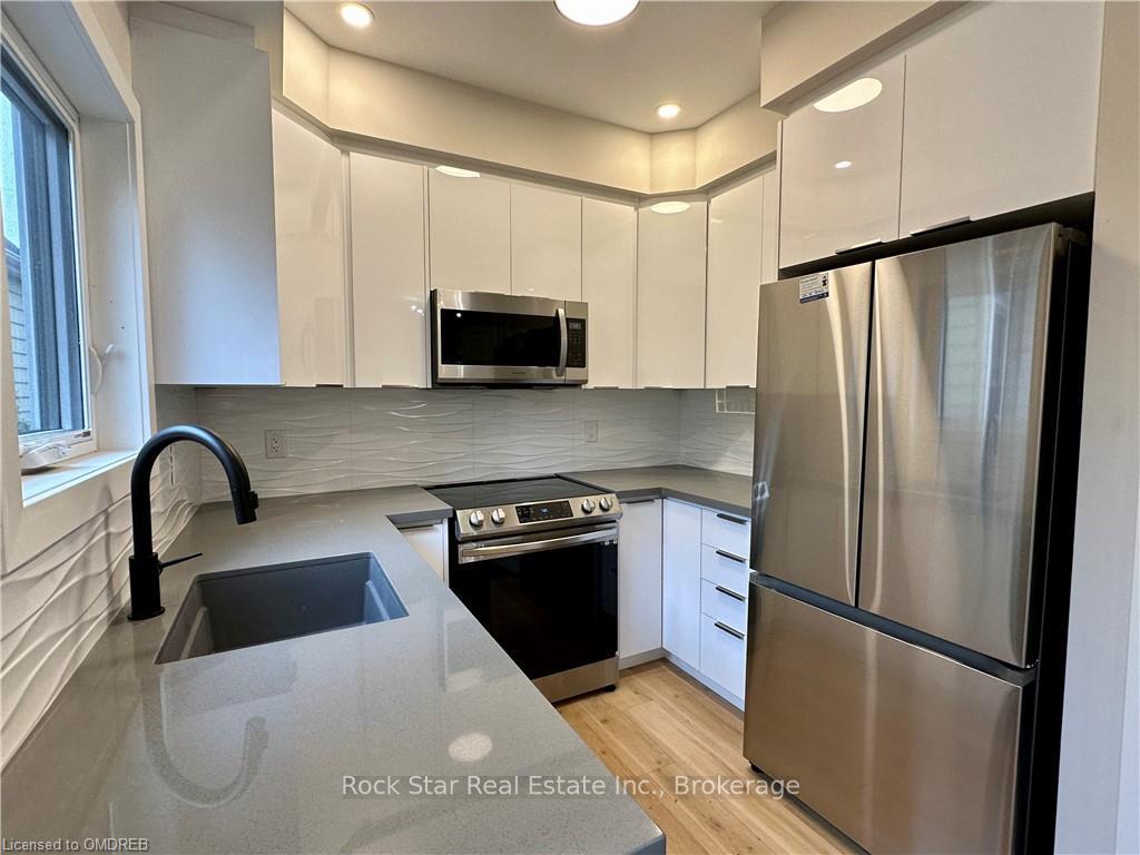 Photo 3 of 58B East 24TH Street, Hamilton, Eastmount — HOMEH