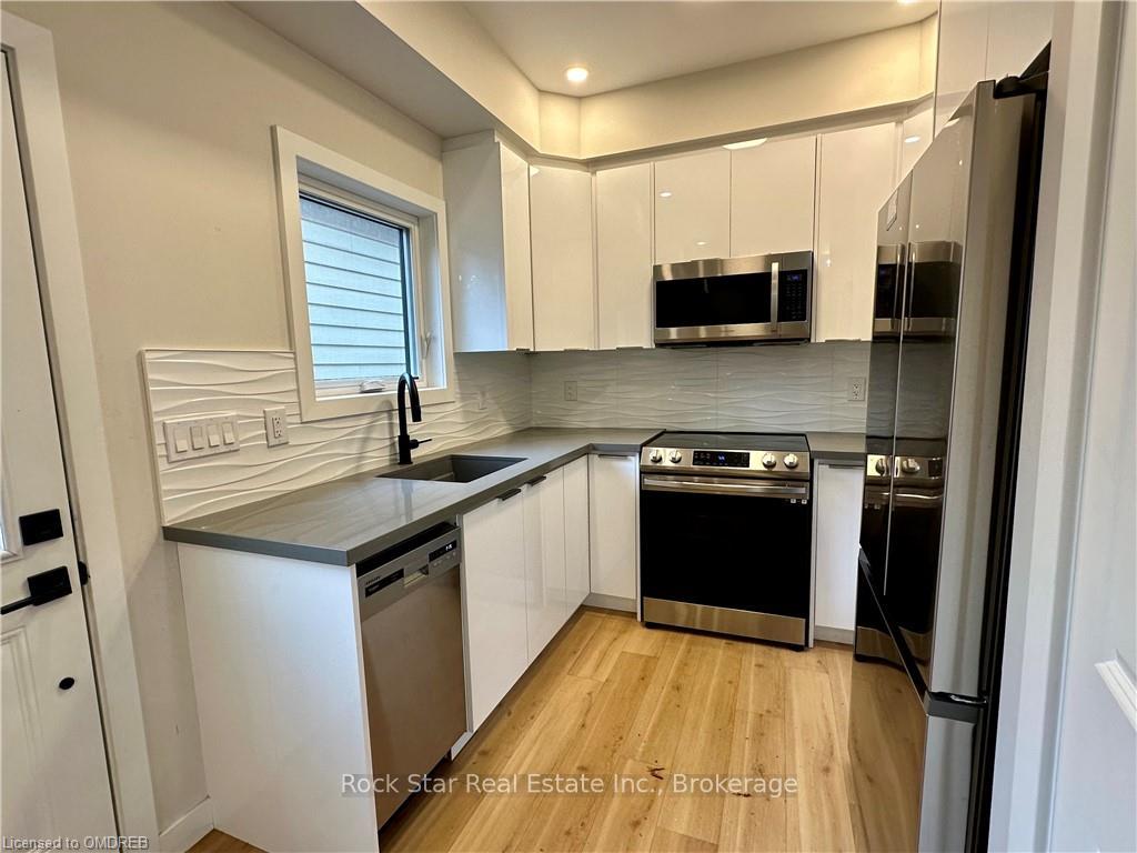 Photo 4 of 58B East 24TH Street, Hamilton, Eastmount — HOMEH