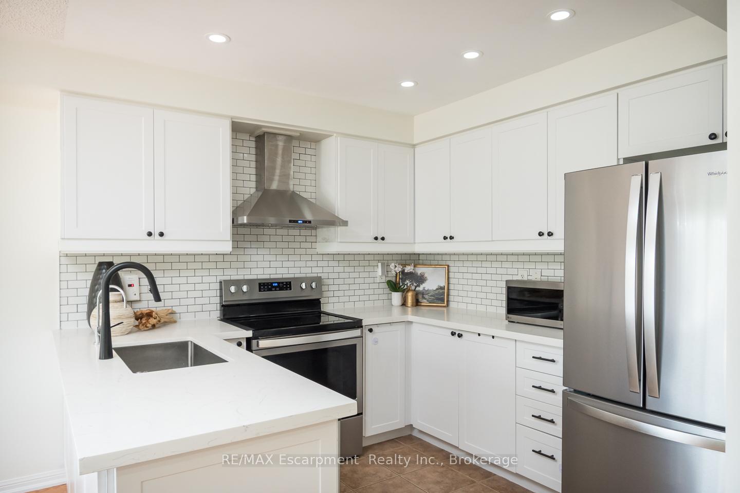 Photo 6 of Unit 11, 620 Ferguson Drive, Milton, Beaty — HOMEH