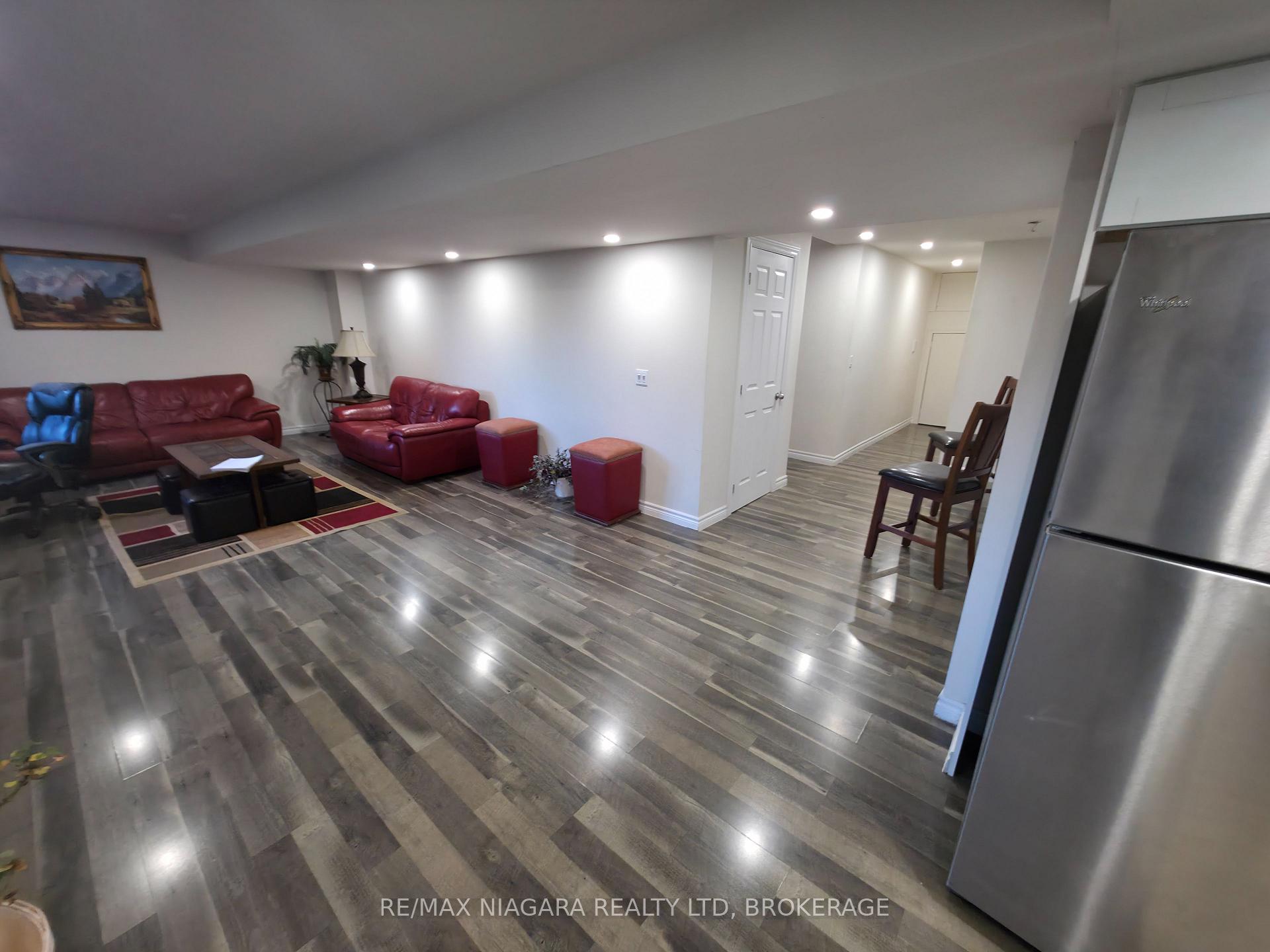 Photo 5 of Unit Lower, 7879 Buckeye Crescent, Niagara Falls, Brown — HOMEH