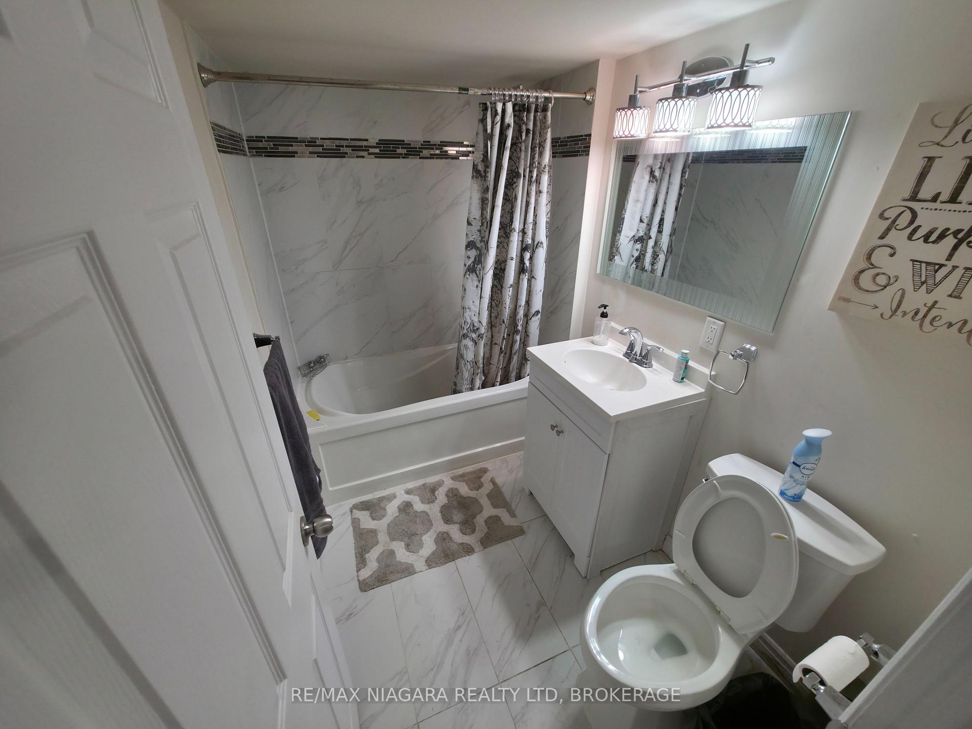 Photo 12 of Unit Lower, 7879 Buckeye Crescent, Niagara Falls, Brown — HOMEH
