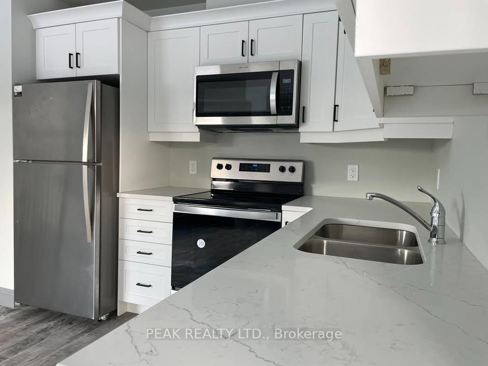 Photo 3 of Unit 301, 600 Norfolk Street, Norfolk, Simcoe — HOMEH