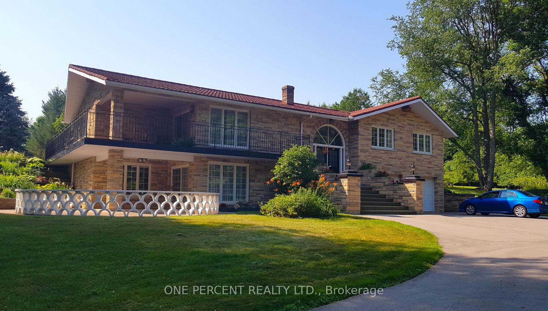 Front of 266132 Maple Dell Road