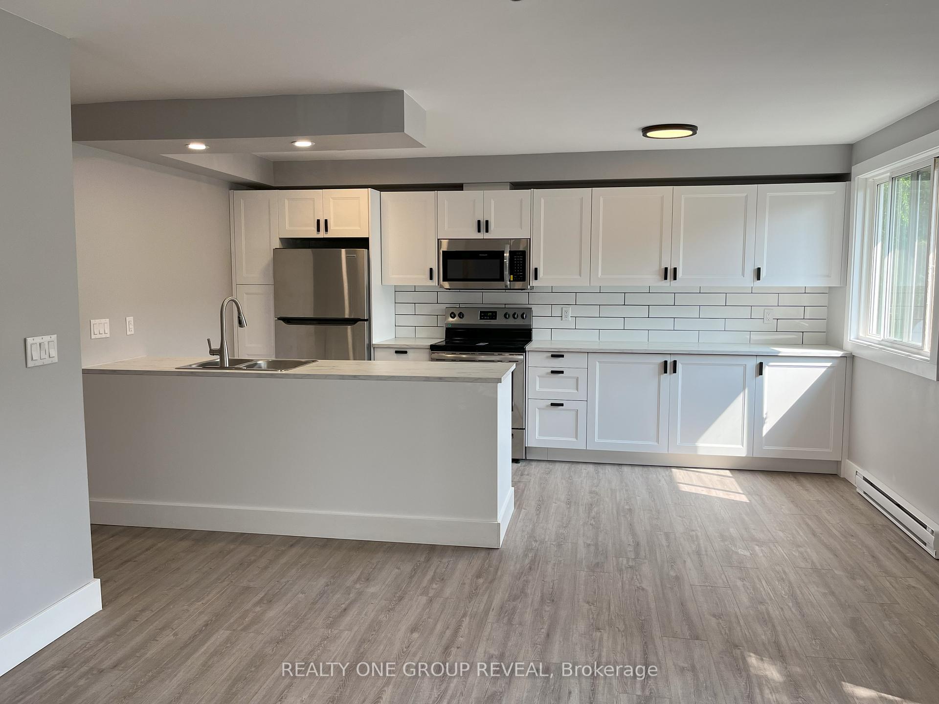 Photo 2 of Unit 4, 25 Montclair Crescent, Norfolk, Simcoe — HOMEH
