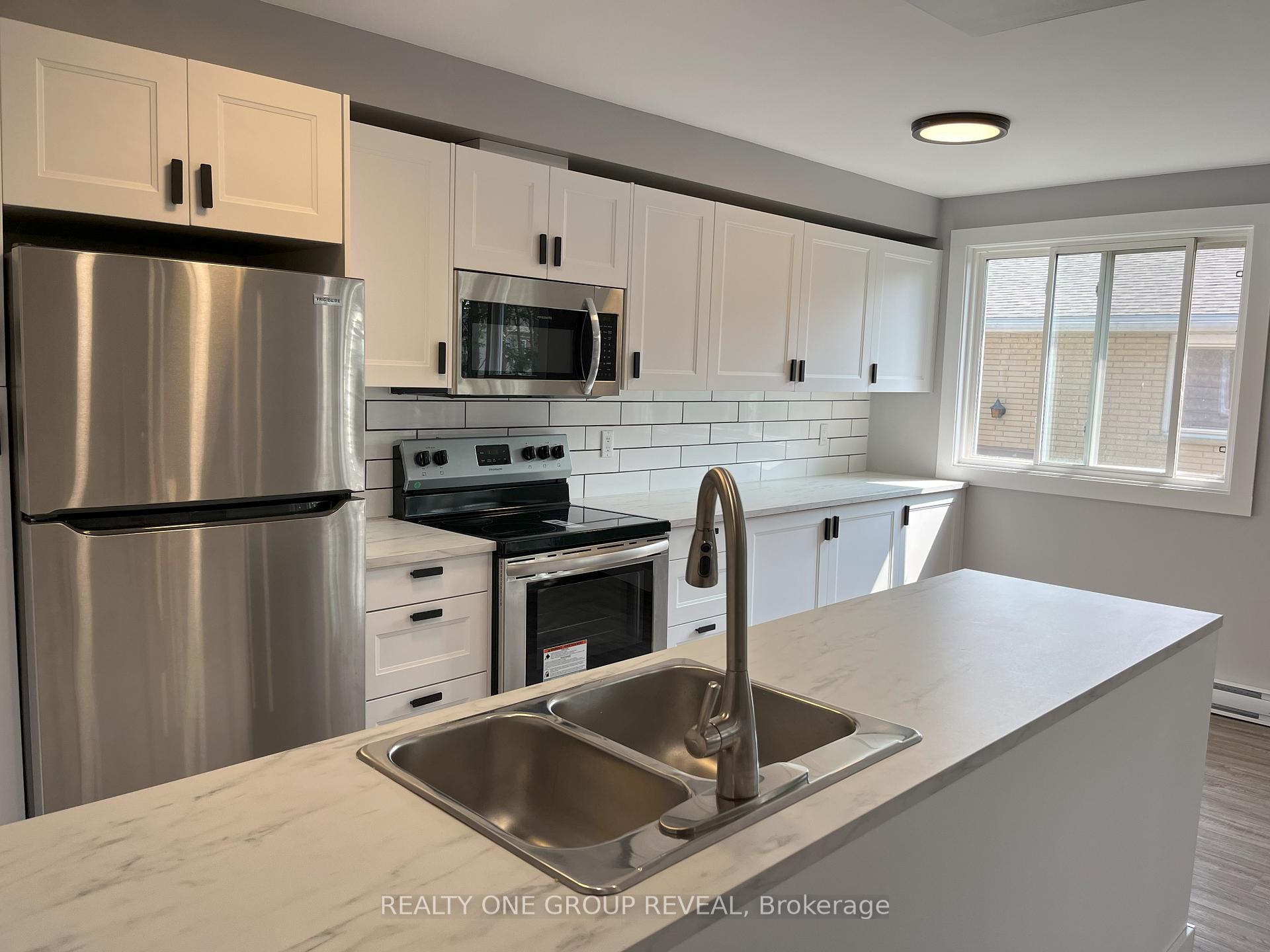 Photo 3 of Unit 4, 25 Montclair Crescent, Norfolk, Simcoe — HOMEH