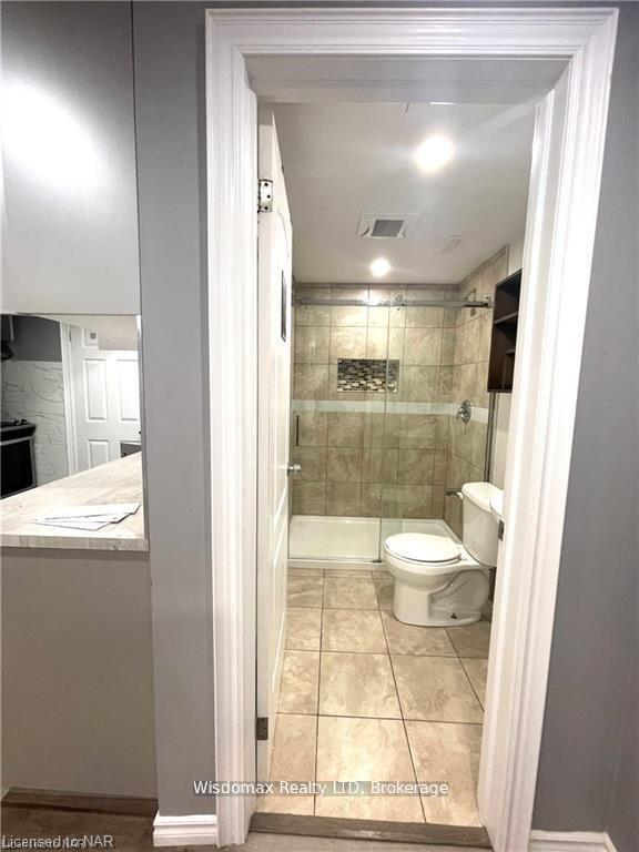 Photo 9 of 7729 Hackberry Trail N, Niagara Falls, Brown — HOMEH