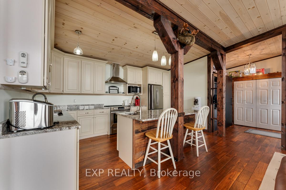 Photo 11 of 1083 Riverside Drive, Parry Sound Remote Area, Henvey — HOMEH