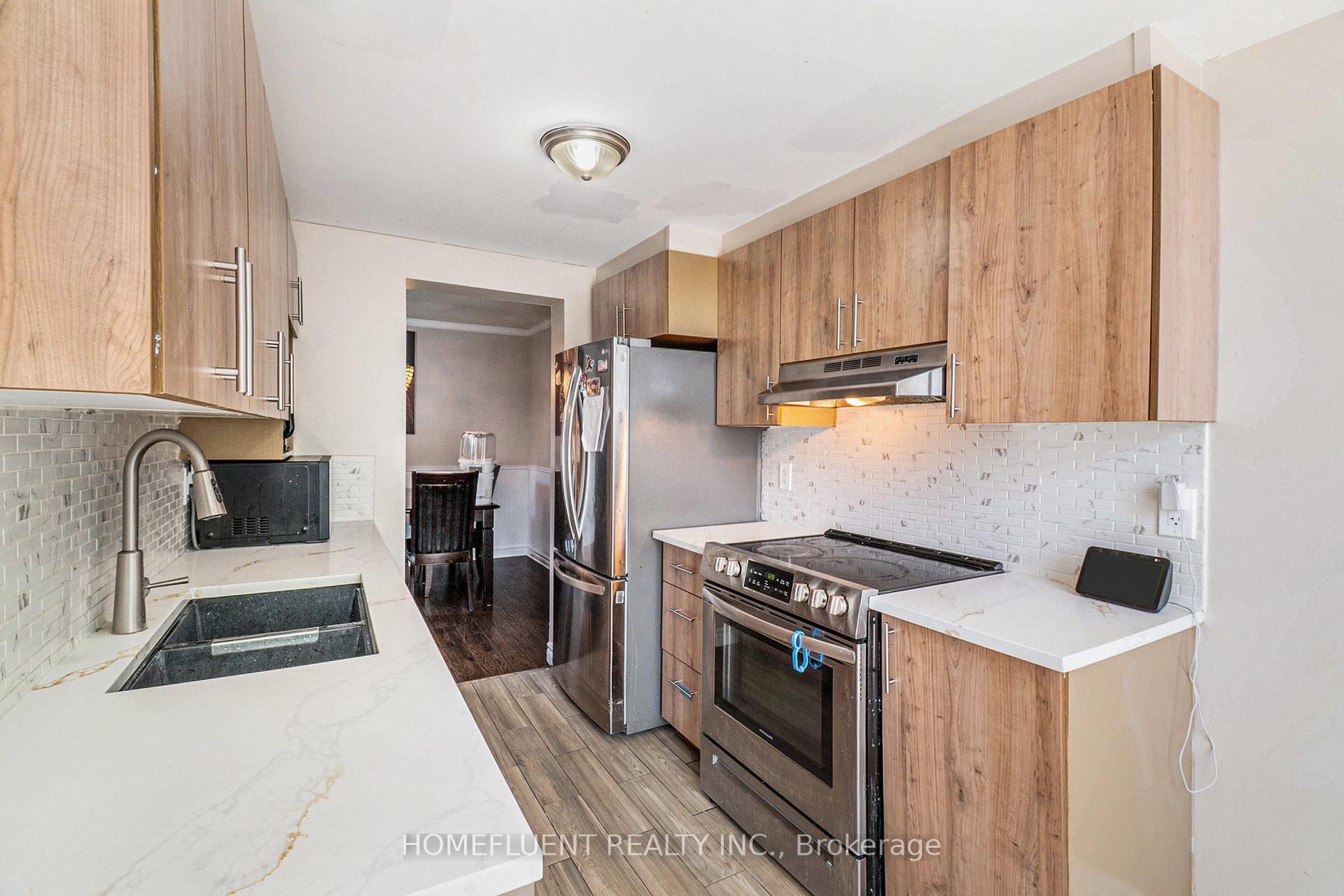 Photo 2 of 411 Sparkman Avenue, Ottawa, Avalon East — HOMEH