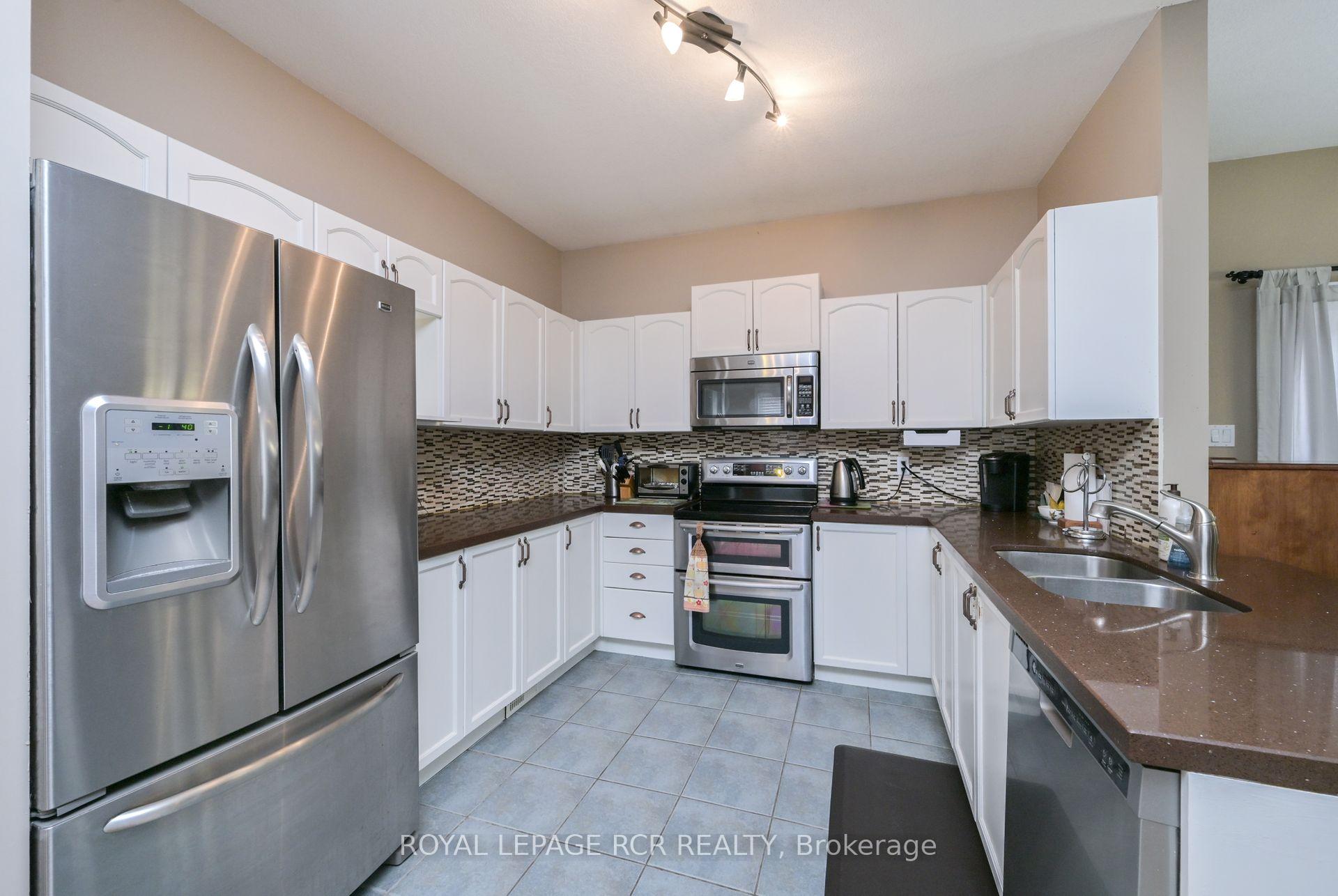 Photo 2 of 26 Benjamin Crescent, Orangeville — HOMEH