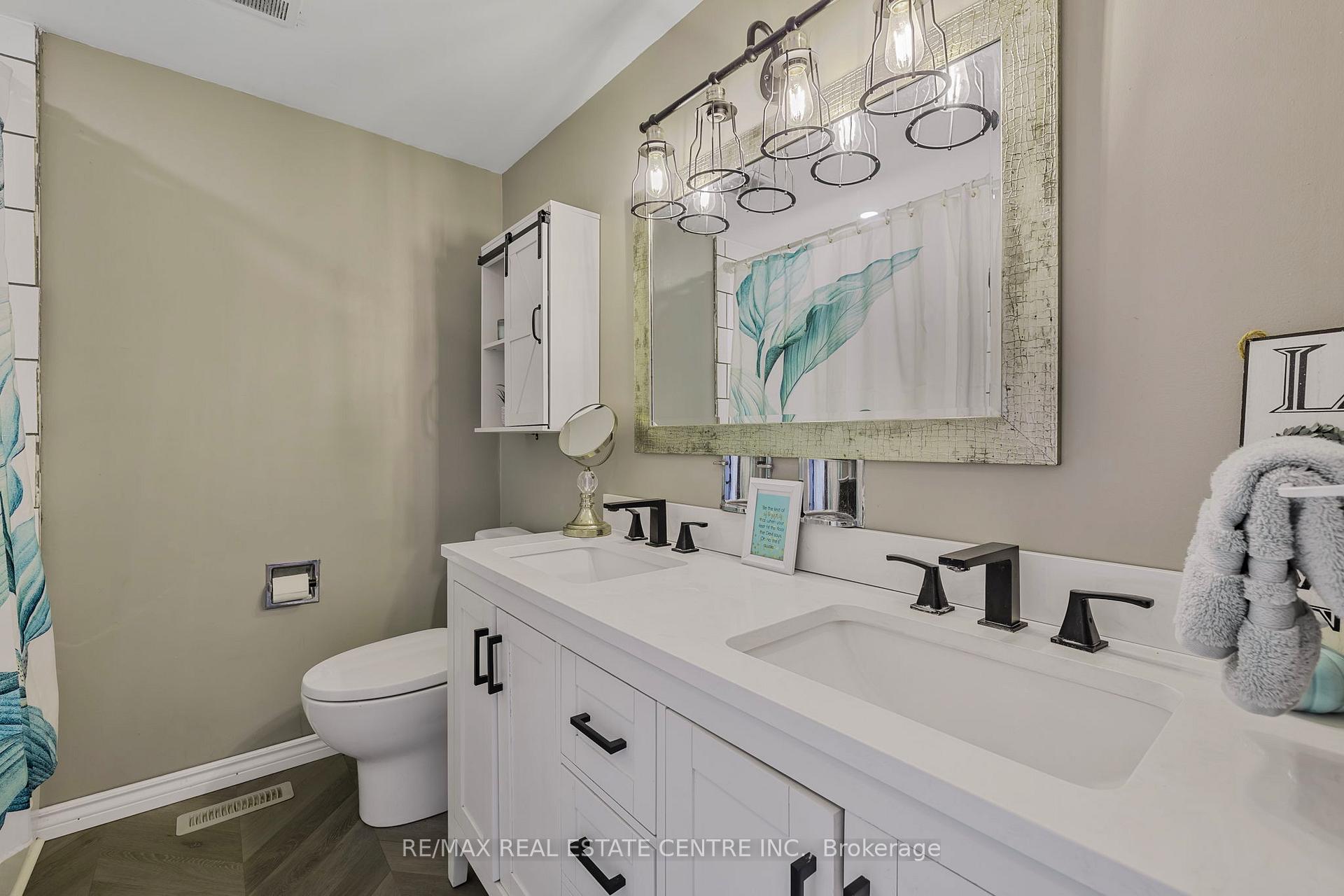 Photo 17 of 24 Carlton Drive, Orangeville — HOMEH