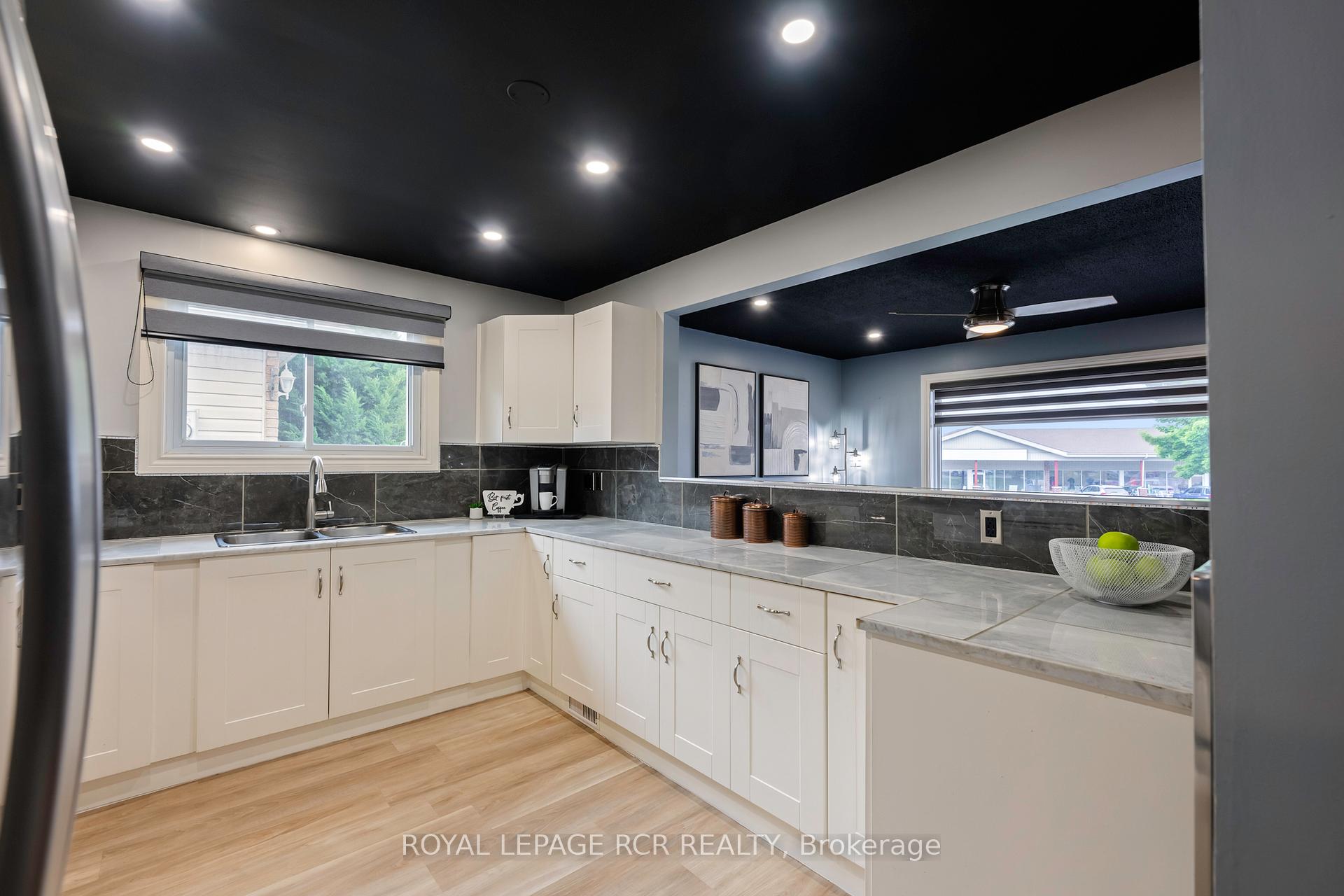 Photo 5 of 31 Dawson Road, Orangeville — HOMEH