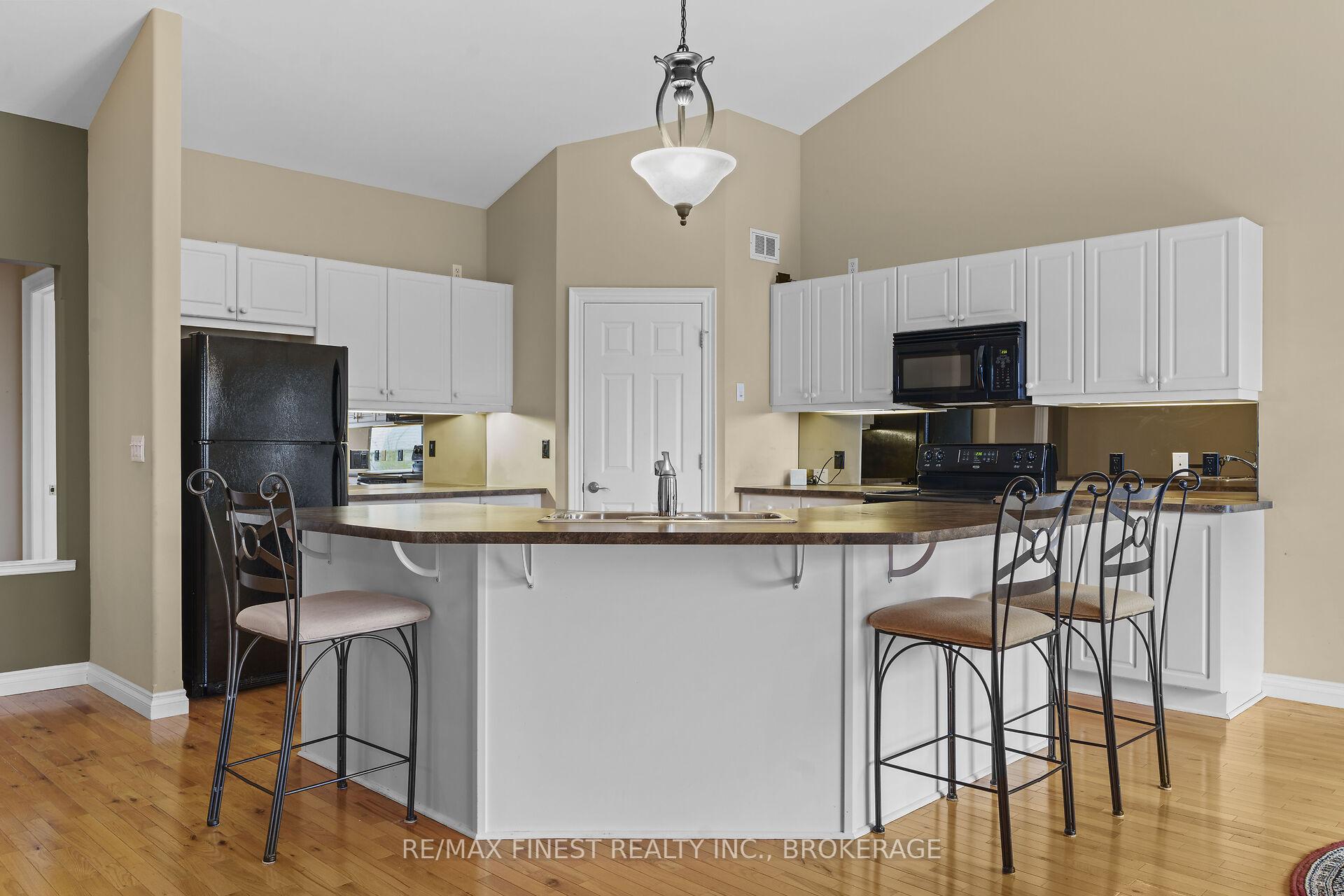 Photo 12 of 823 Kananaskis Drive, Kingston, City Northwest — HOMEH