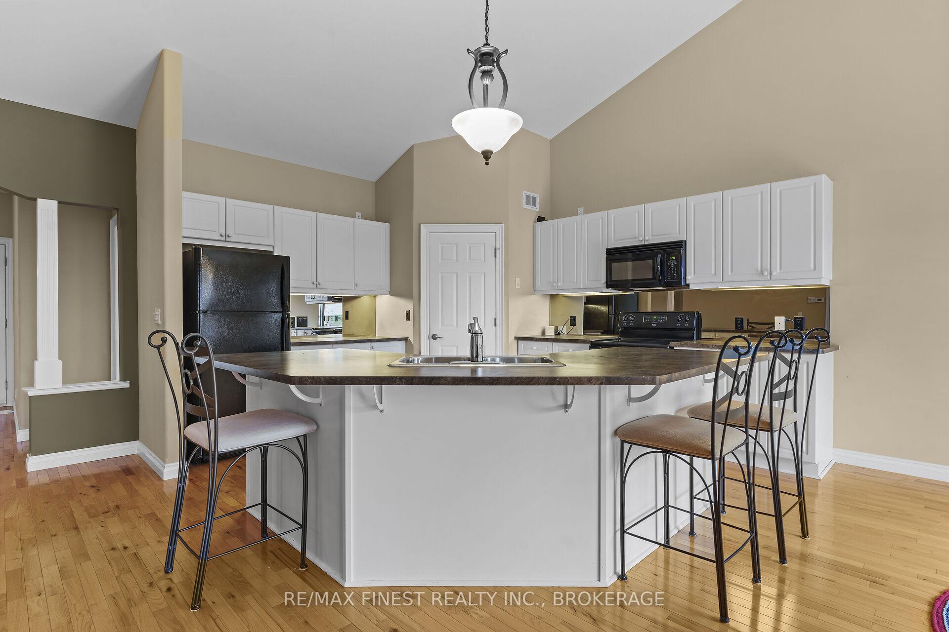 Photo 13 of 823 Kananaskis Drive, Kingston, City Northwest — HOMEH
