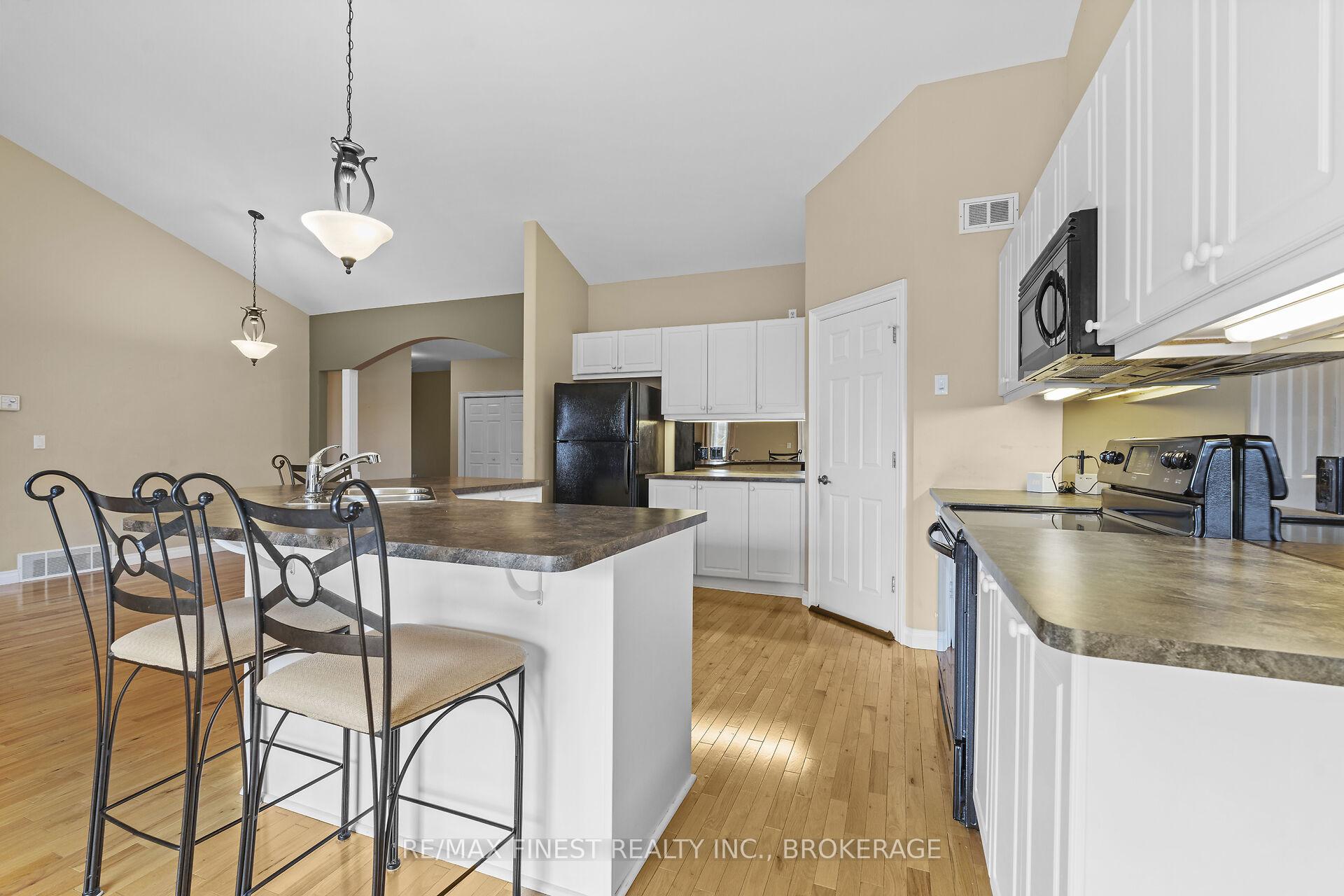 Photo 14 of 823 Kananaskis Drive, Kingston, City Northwest — HOMEH