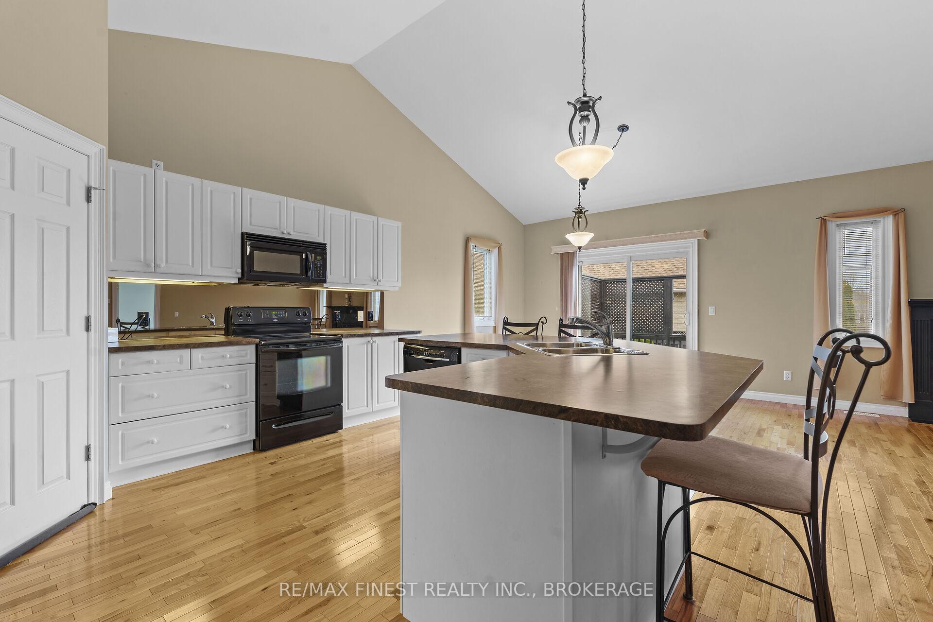 Photo 15 of 823 Kananaskis Drive, Kingston, City Northwest — HOMEH