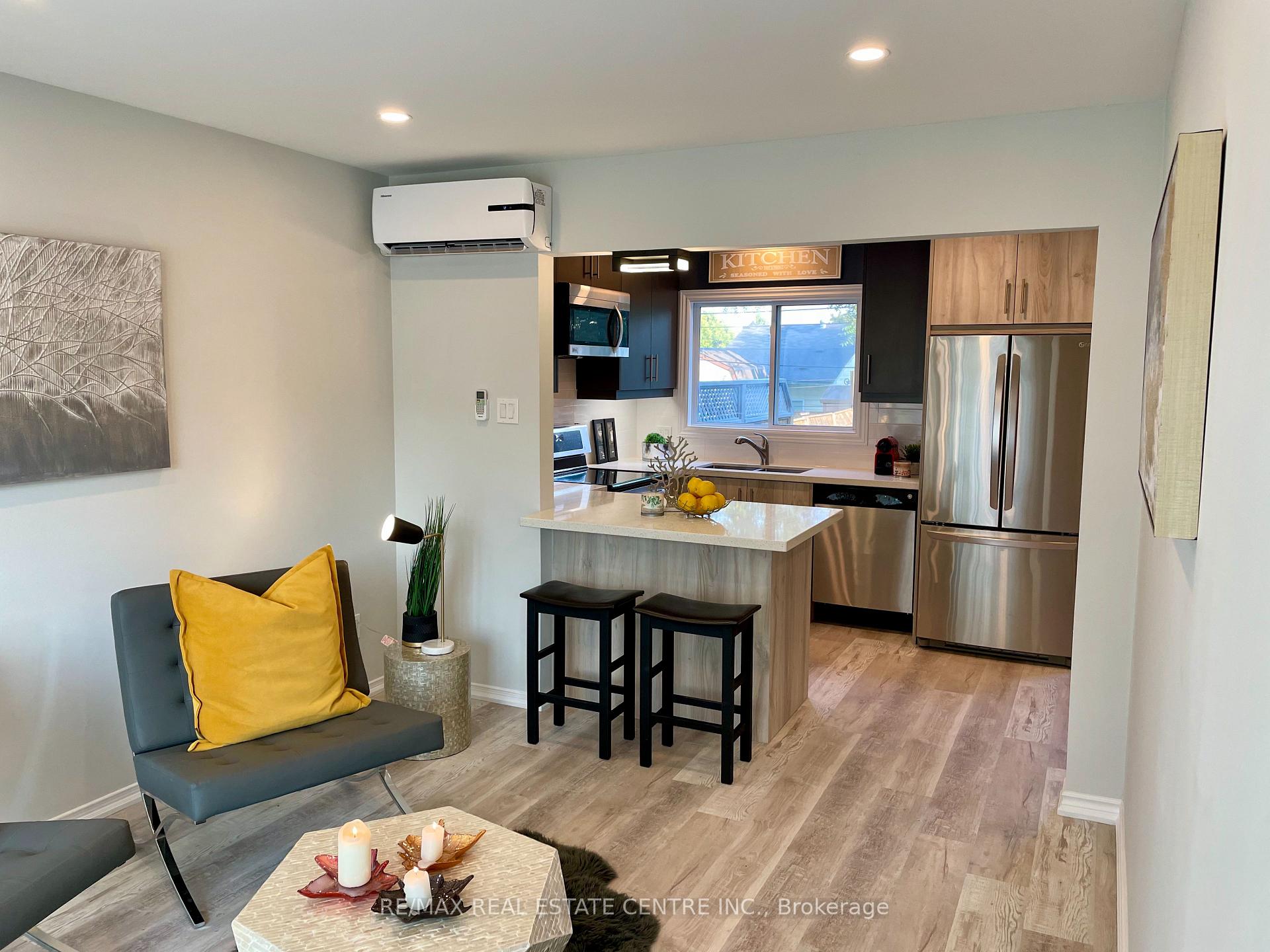 Photo 3 of Unit 1, 79 Town Line, Orangeville — HOMEH