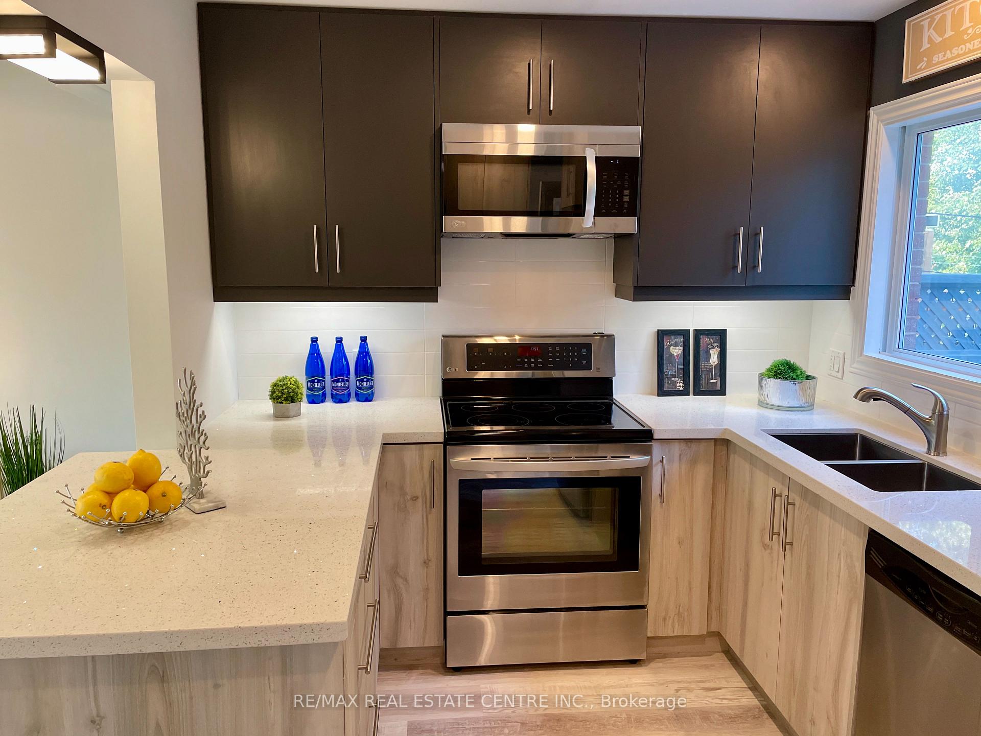 Photo 5 of Unit 1, 79 Town Line, Orangeville — HOMEH