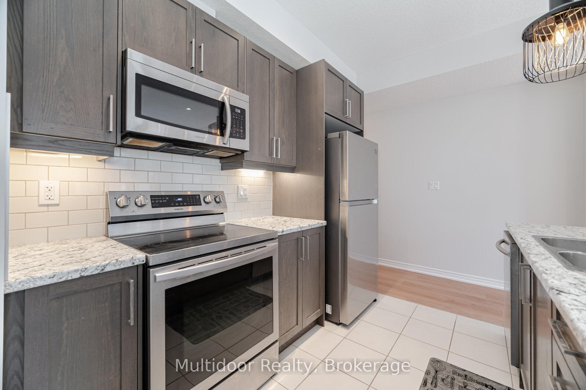 Photo 1 of Unit 52, 445 Ontario Street S, Milton, Timberlea — HOMEH