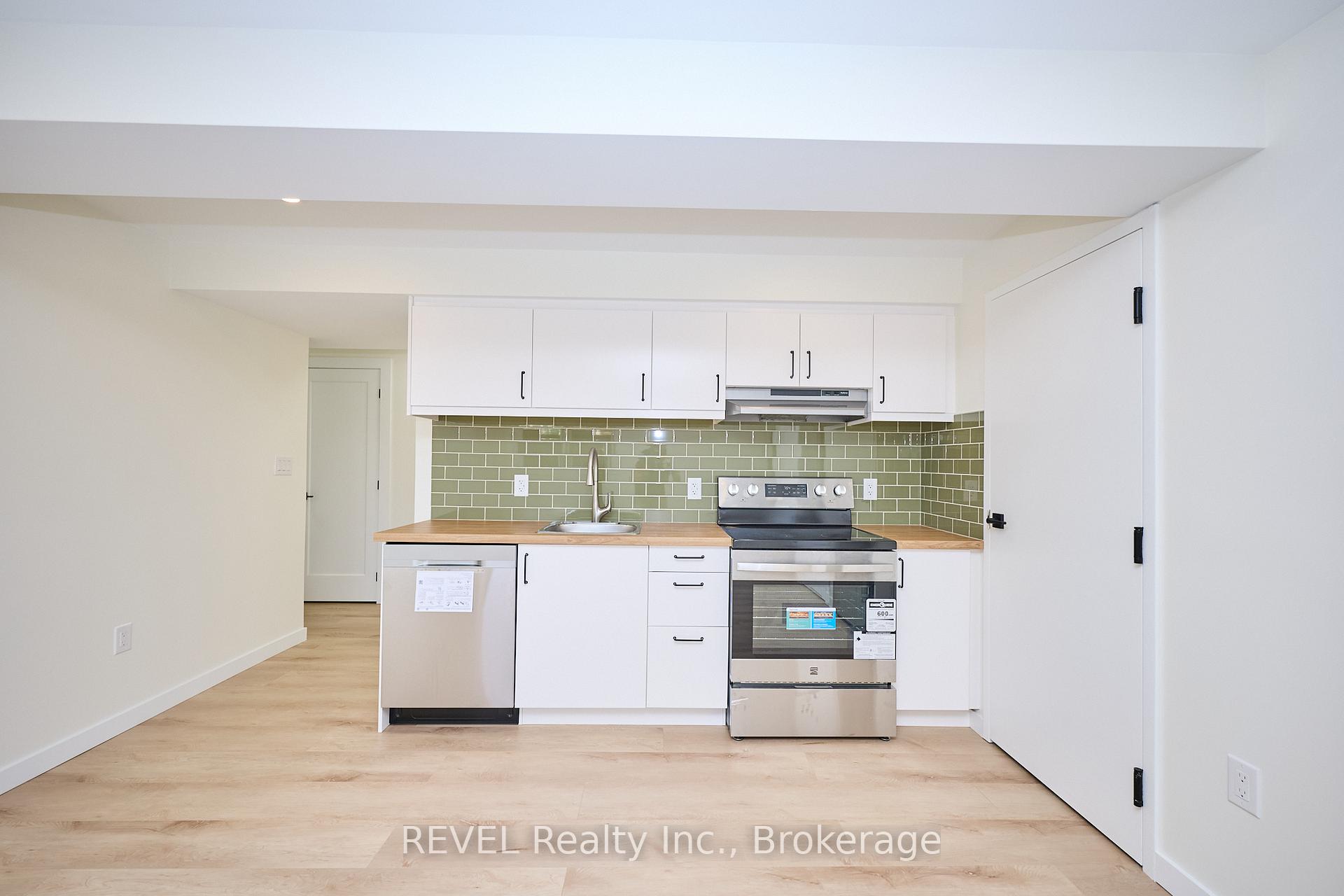 Photo 4 of Unit Lower Unit, 4652 Belfast Avenue, Niagara Falls, Ascot — HOMEH