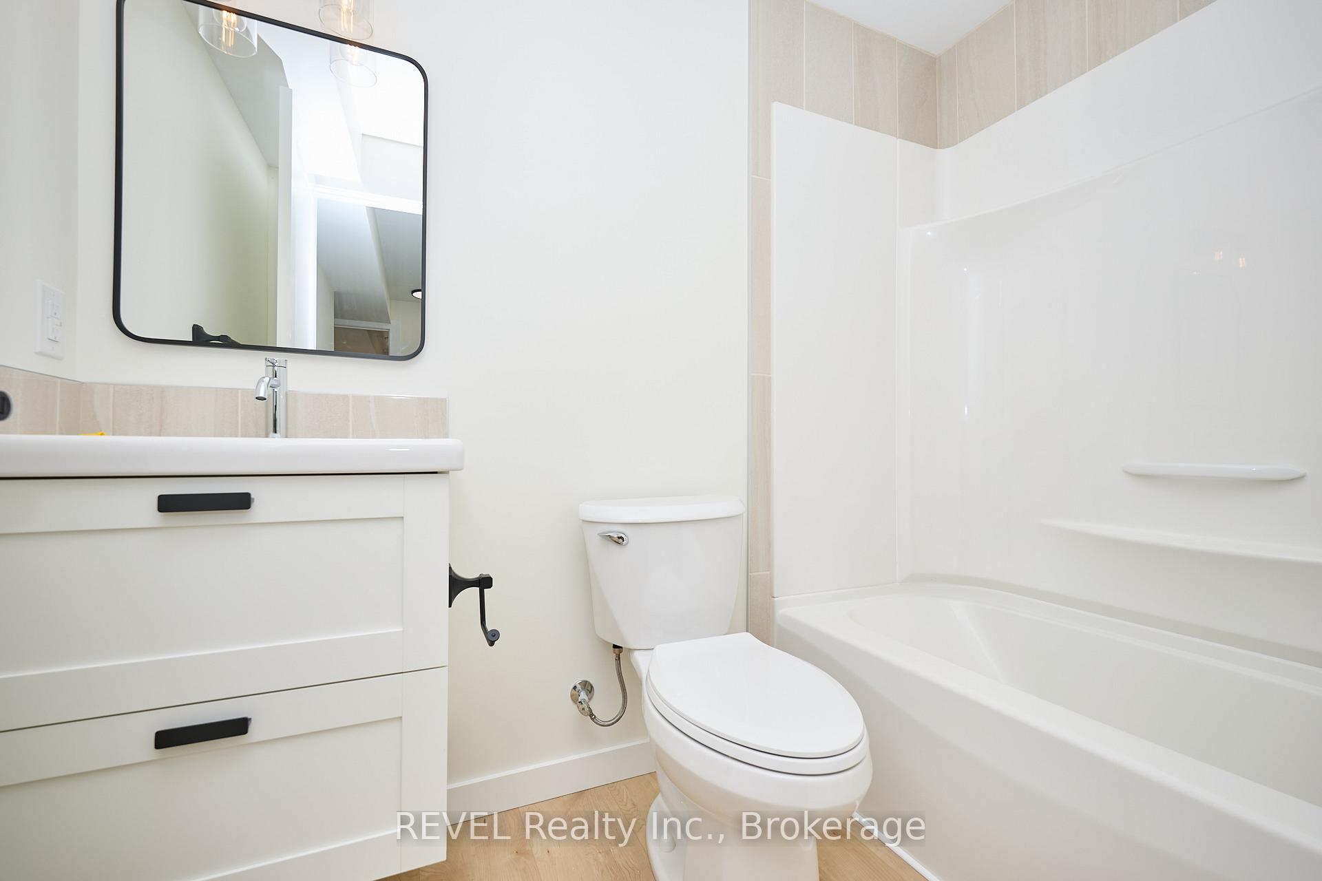 Photo 8 of Unit Lower Unit, 4652 Belfast Avenue, Niagara Falls, Ascot — HOMEH