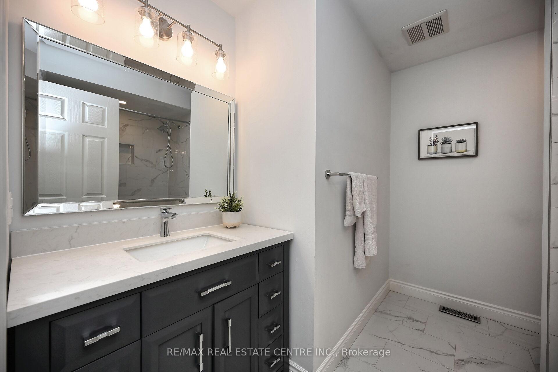 Photo 9 of 24 Sloan Drive, Milton, Dempsey — HOMEH
