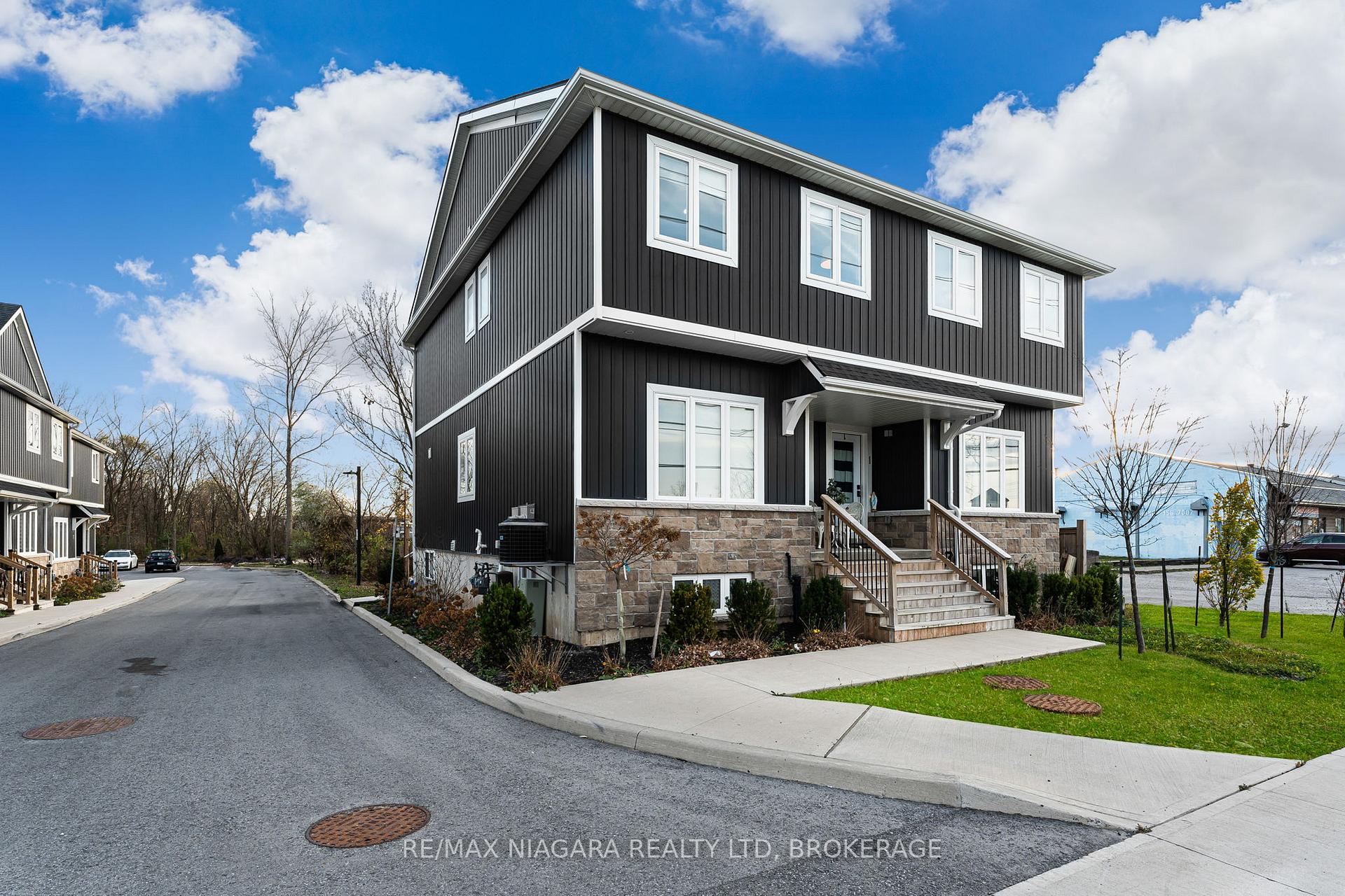 Photo 2 of Unit 2 UPPER, 8196 Mcleod Road, Niagara Falls, Brown — HOMEH