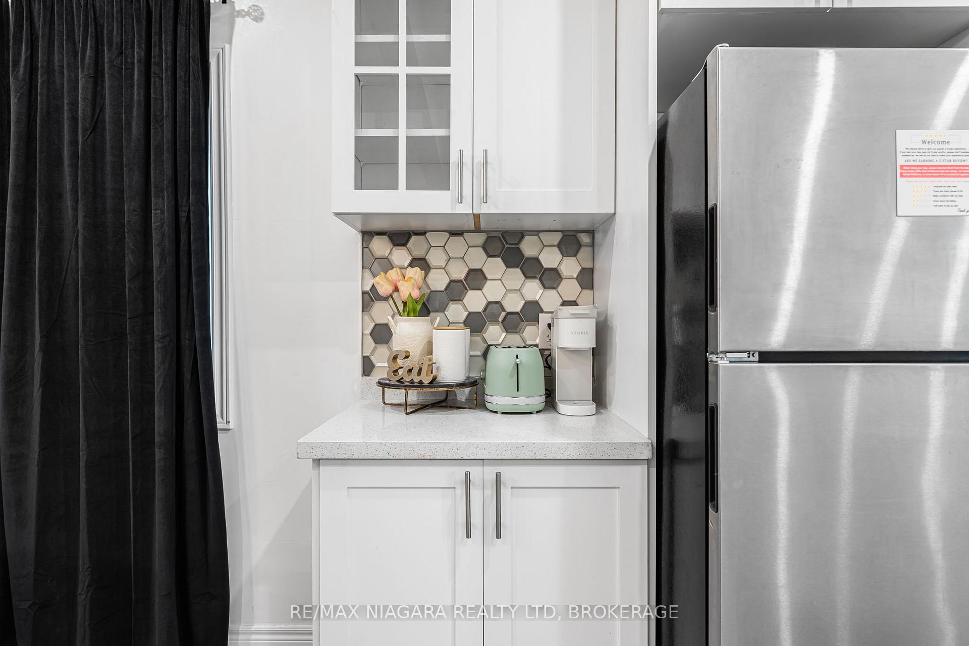 Photo 20 of Unit 2 UPPER, 8196 Mcleod Road, Niagara Falls, Brown — HOMEH