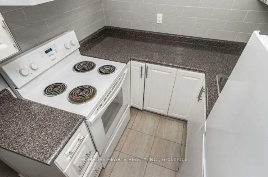 Photo 2 of 371 Rossland Road E, Oshawa, O'Neill — HOMEH