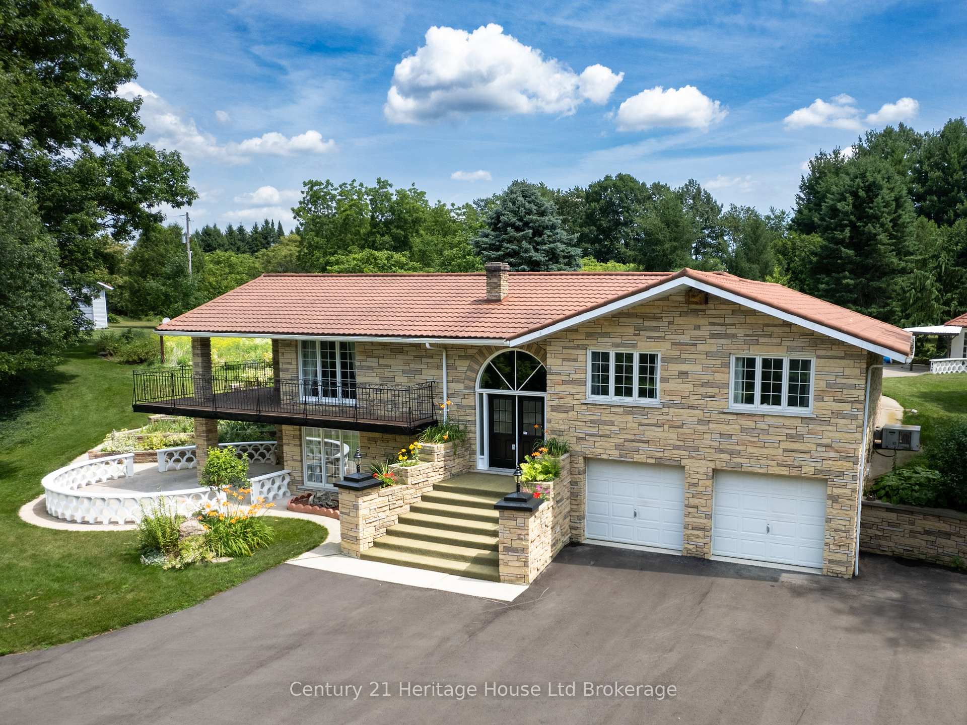 Front of 266132 Maple Dell Road