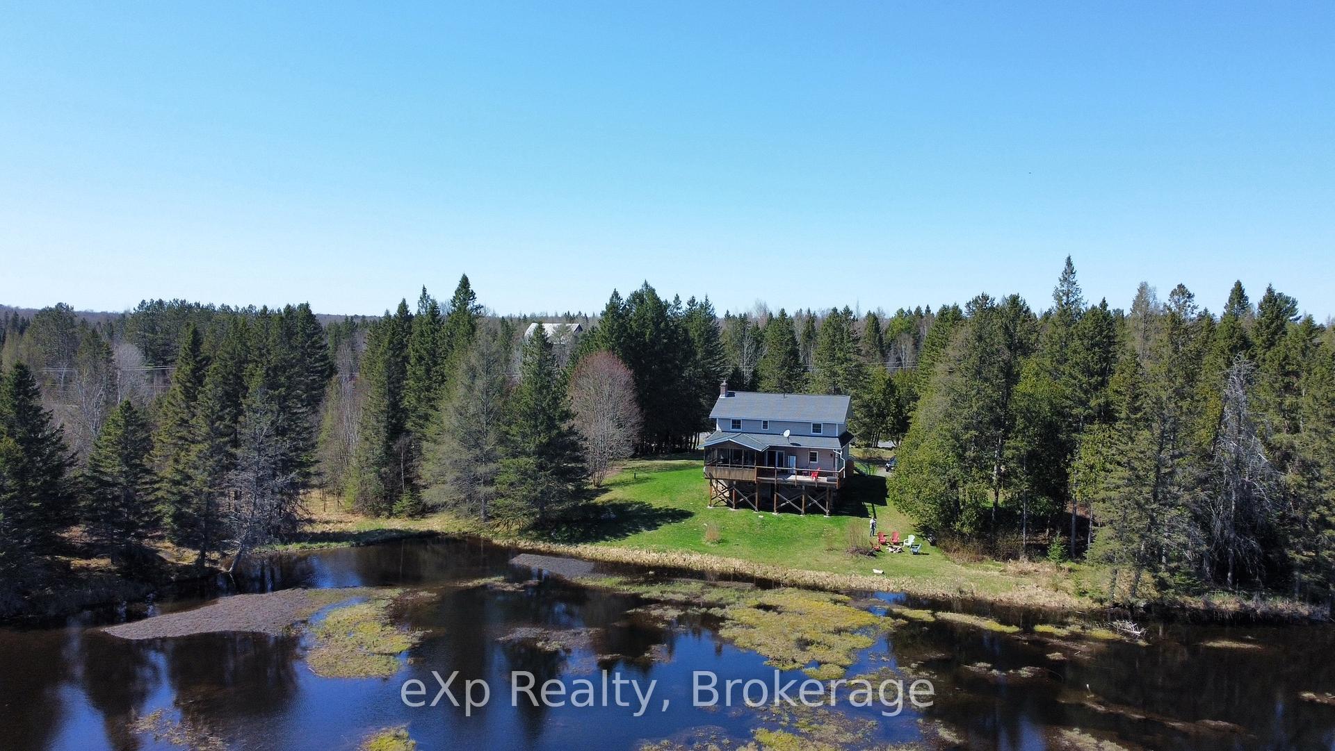 Photo 4 of 12317 522 Highway, Parry Sound Remote Area, Wilson — HOMEH