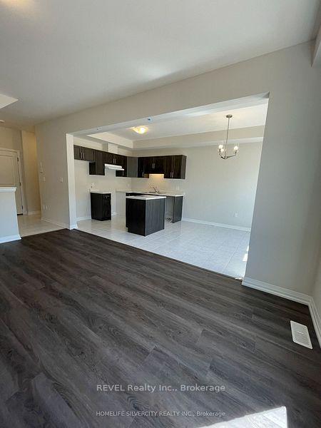 Photo 8 of 7397 Matteo Drive, Niagara Falls, Brown — HOMEH
