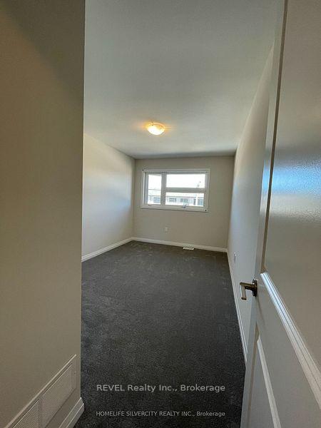 Photo 11 of 7397 Matteo Drive, Niagara Falls, Brown — HOMEH
