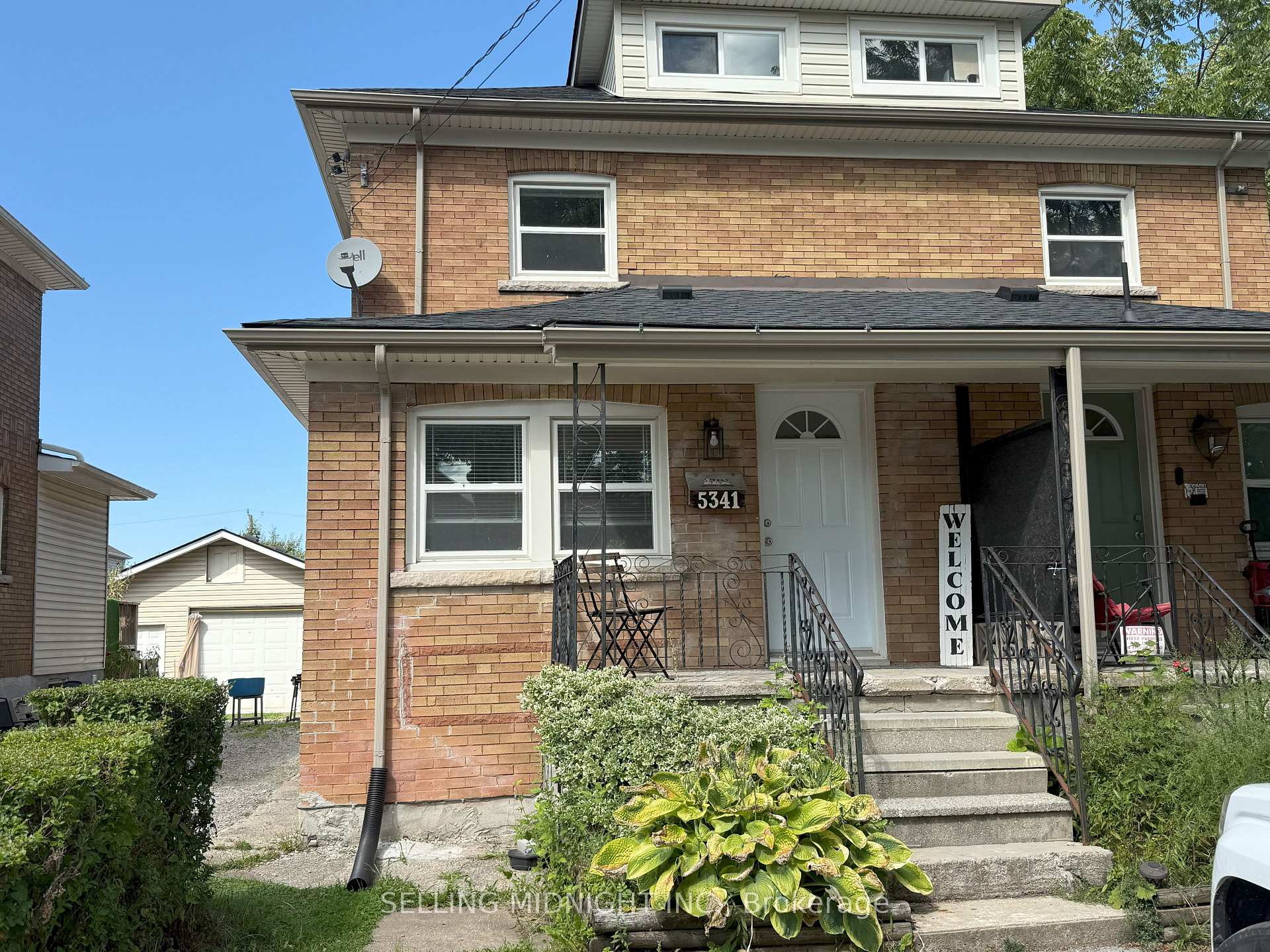 Photo 1 of 5341 Bridge Street, Niagara Falls, Downtown — HOMEH